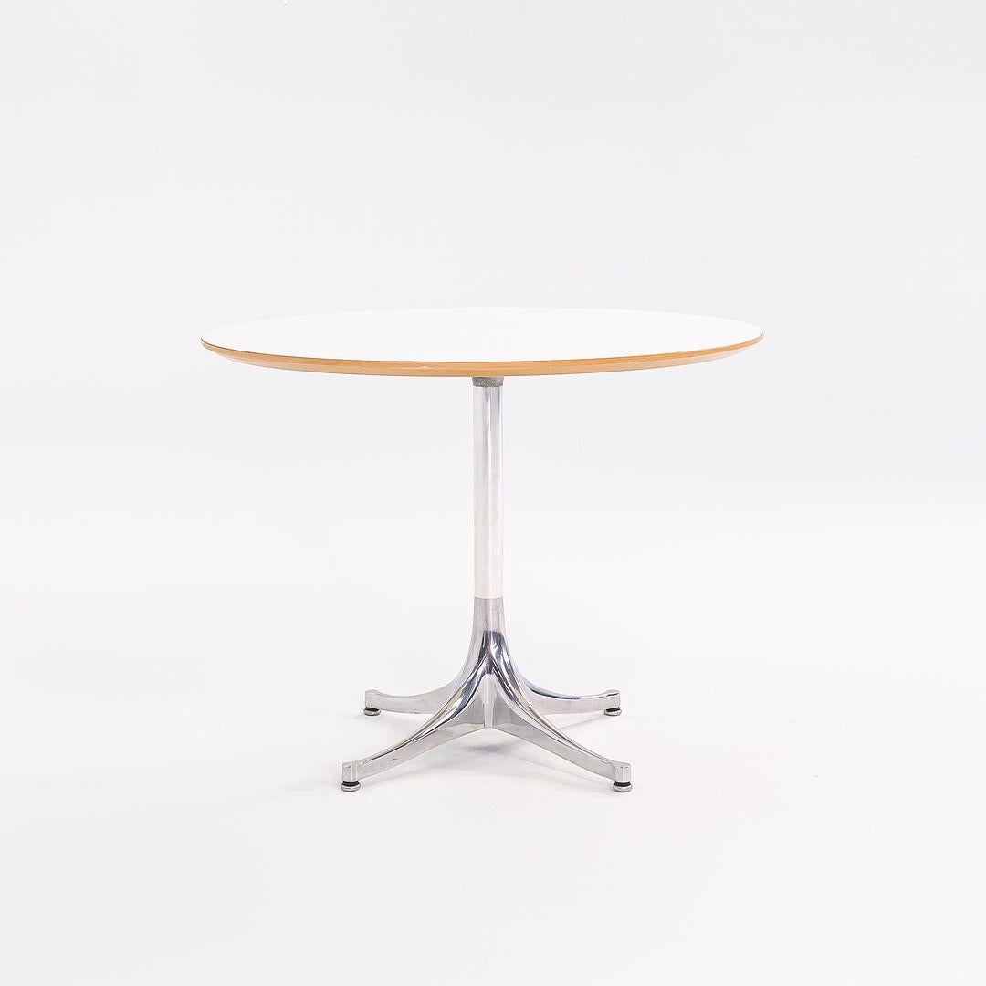 C. Tavolino con piedistallo in laminato bianco George Nelson for Herman Miller, anni 2000, 28