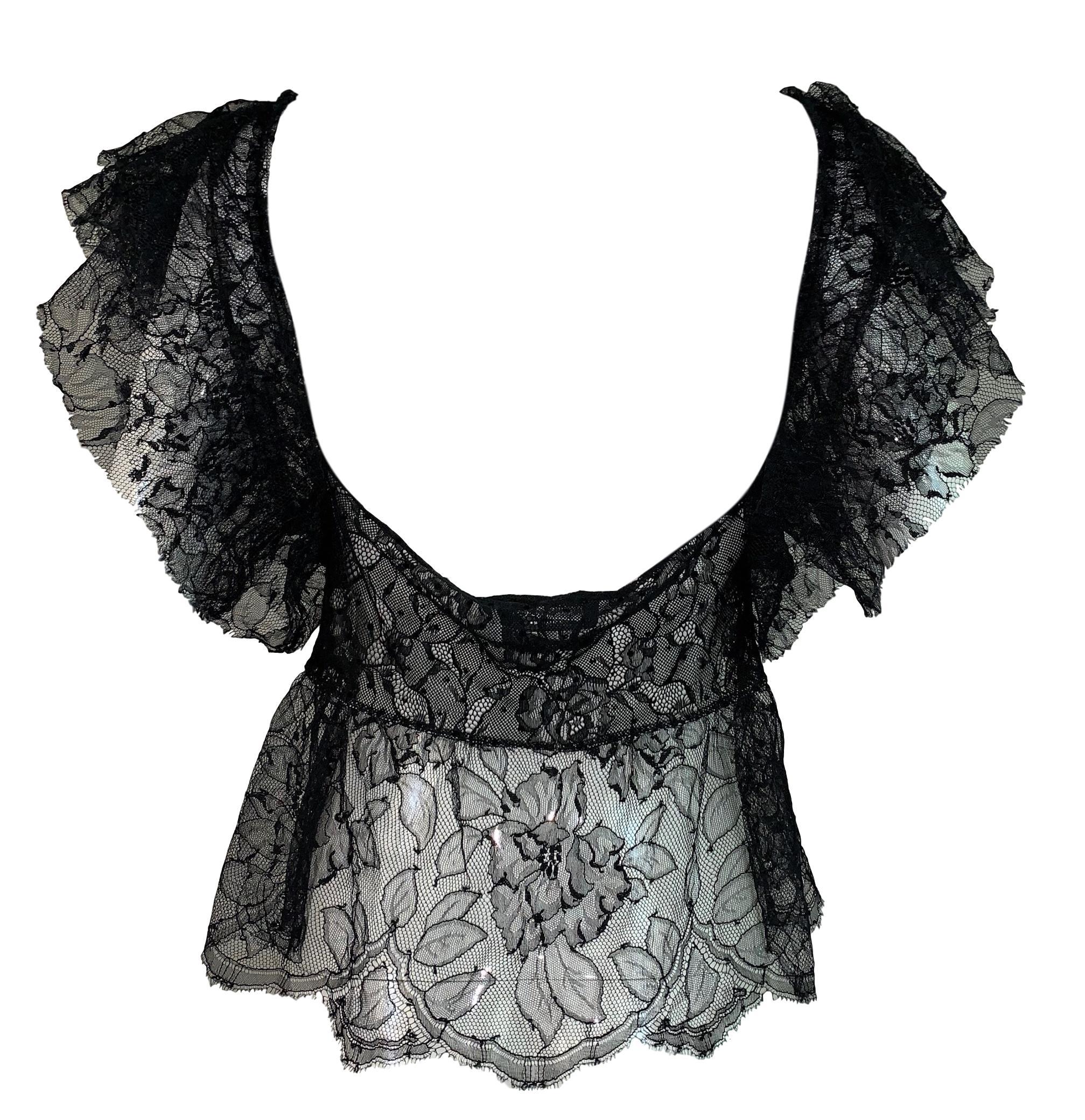 DESIGNER: F/W 2003 Yves Saint Laurent by Tom Ford runway

Please contact for more information and/or photos.

CONDITION: Good- no flaws!

FABRIC:  Rayon & Nylon

COUNTRY MADE: Italy 

SIZE: S 

MEASUREMENTS; provided as a courtesy only- not a