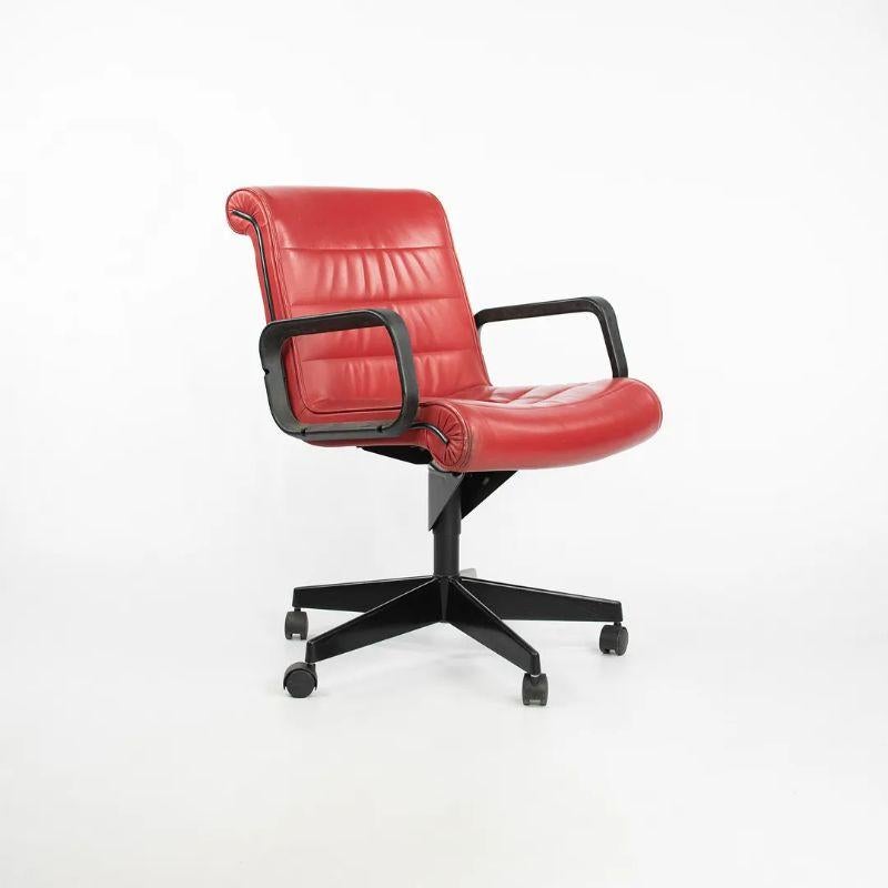 This is a Sapper Series management desk chair, designed by Richard Sapper in 1979 and produced by Knoll. These examples date to circa 2006. The listed price includes one chair, and we have several available. The design features red leather
