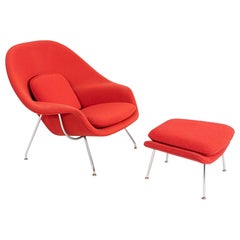 C. 2010 Eero Saarinen Full-Size Womb Chair 
Ottoman in Crimson Red Boucle