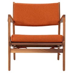 C. 2020 Jens Risom Lounge Chair and Ottoman for DWR in Orange Maharam Fabric
