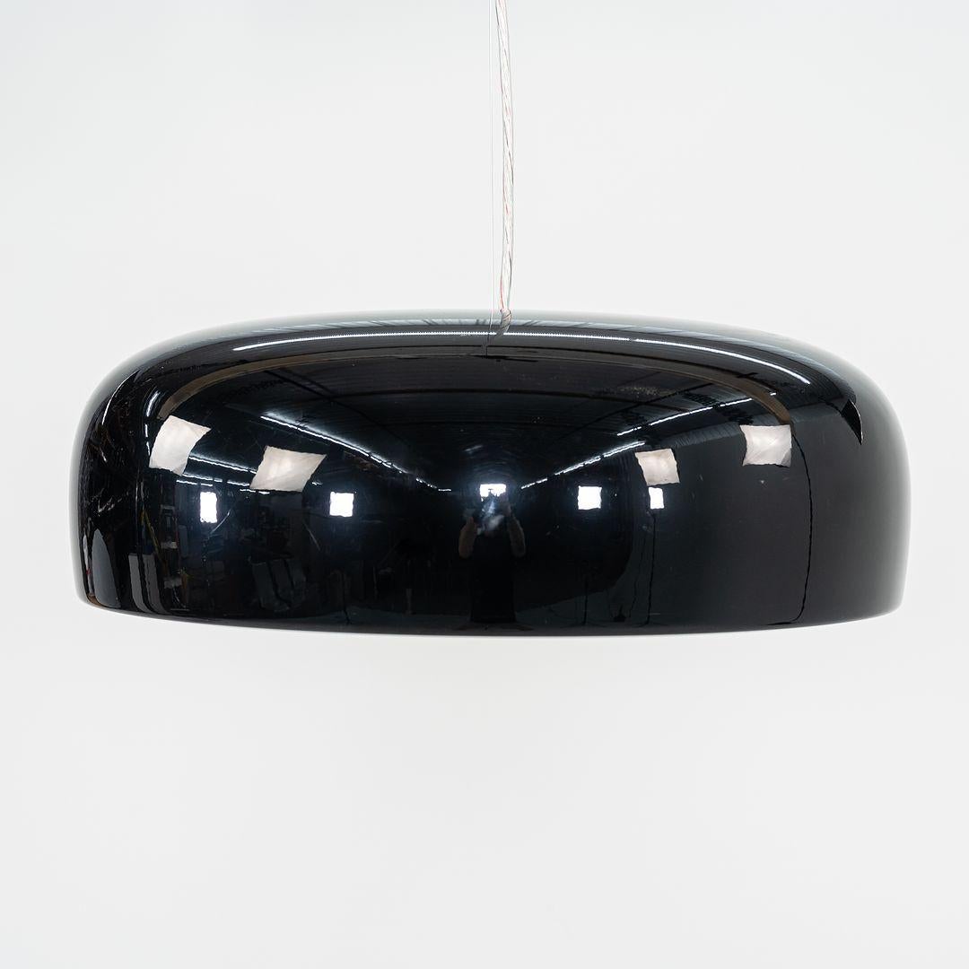 This is a Smithfield Suspension Pro, originally designed by Jasper Morrison in 2009. These particular pendant lights were produced by Flos in Italy circa 2022. They are made from aluminum and polycarbonate. The listed price includes one light and we