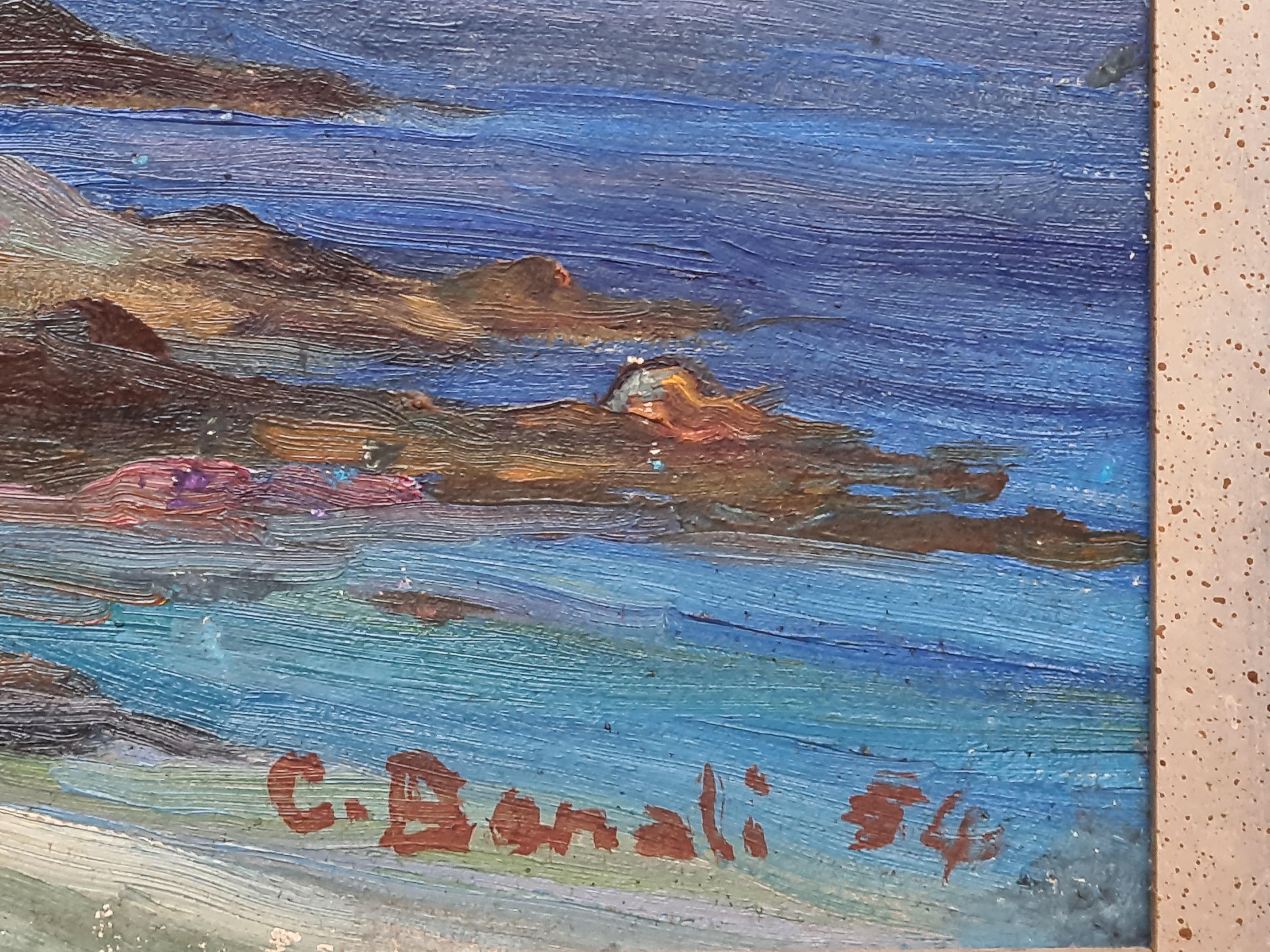 A colourful Impressionist seascape of Cap Corse by C Benali. The painting is signed bottom right and a location, Grischoni, Cap Corse, to the backboard. Presented in patinated silver coloured wood frame.

A charming view of the iconic coastline of