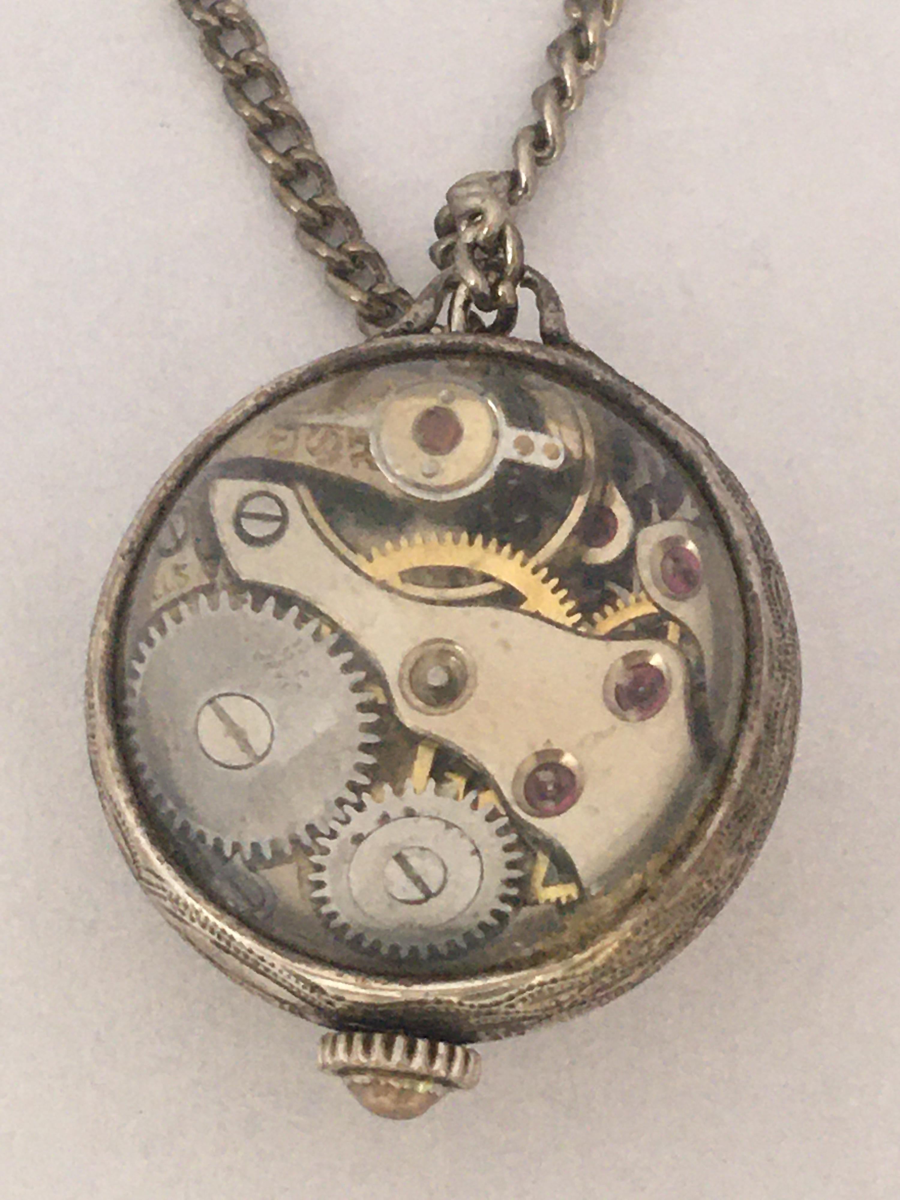 This small and beautiful vintage hand winding fob / pendant ball watch is in good working condition and it is running well. It is recently been serviced. Minor signs of ageing and wear with small and light scratches on the glass as shown. 

Please