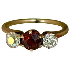 C. D. Peacock Garnet and Diamond 14 Karat Gold Ring - Size 6 1/2