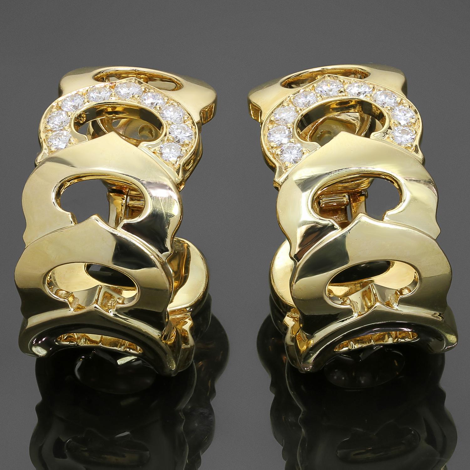 These exquisite authentic C De Cartier clip-on wrap earrings are crafted in 18k yellow gold and set with round brilliant D-E-F VVS1-VVS2 diamonds weighing an estimated 1.0 carats. Made in France circa 1990s. Measurements: 0.55