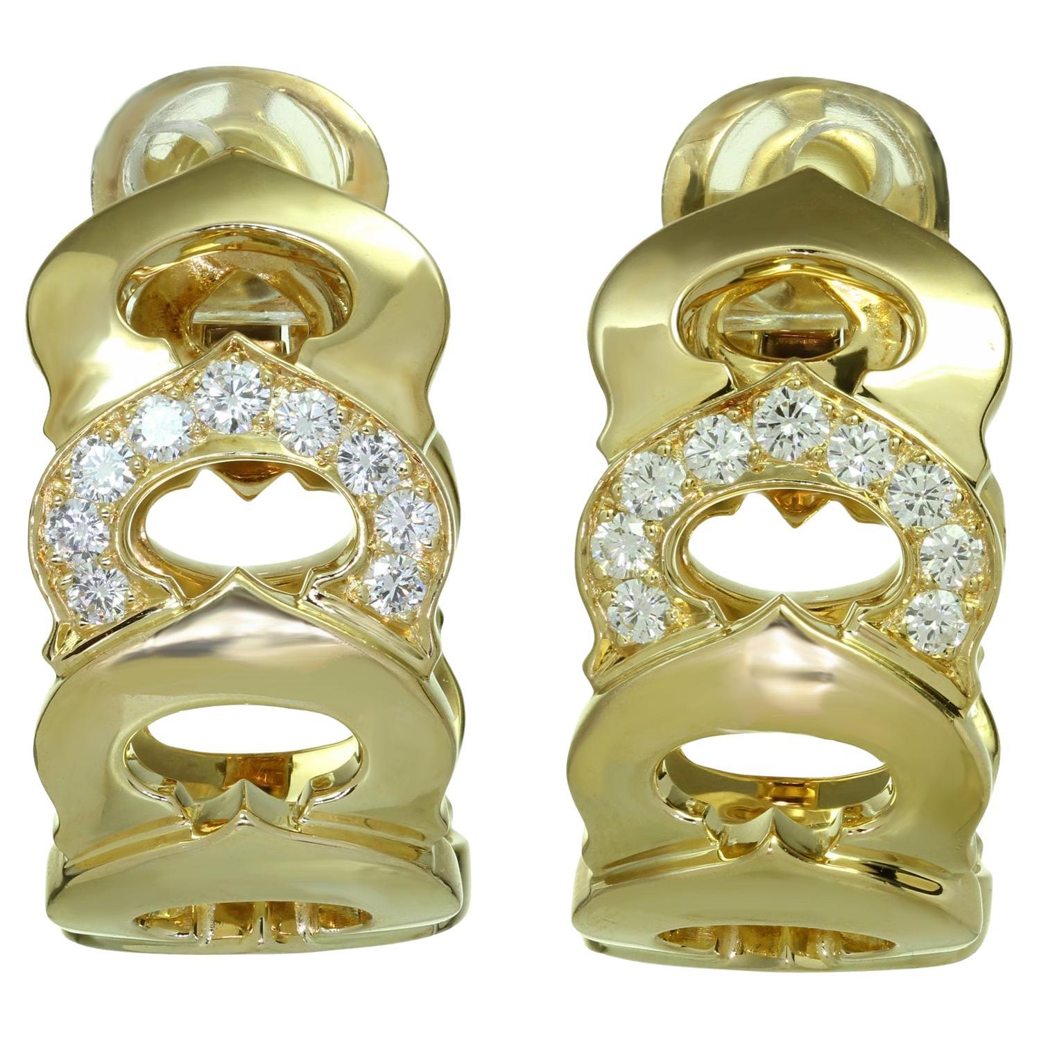 Boucles d'oreilles à clips C De CARTIER en or jaune 18 carats et diamants 