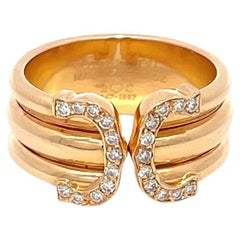  Bague C de Cartier en or jaune 18 carats avec diamants