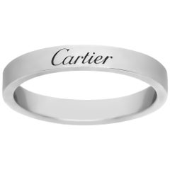 Vintage C De Cartier platinum wedding band.