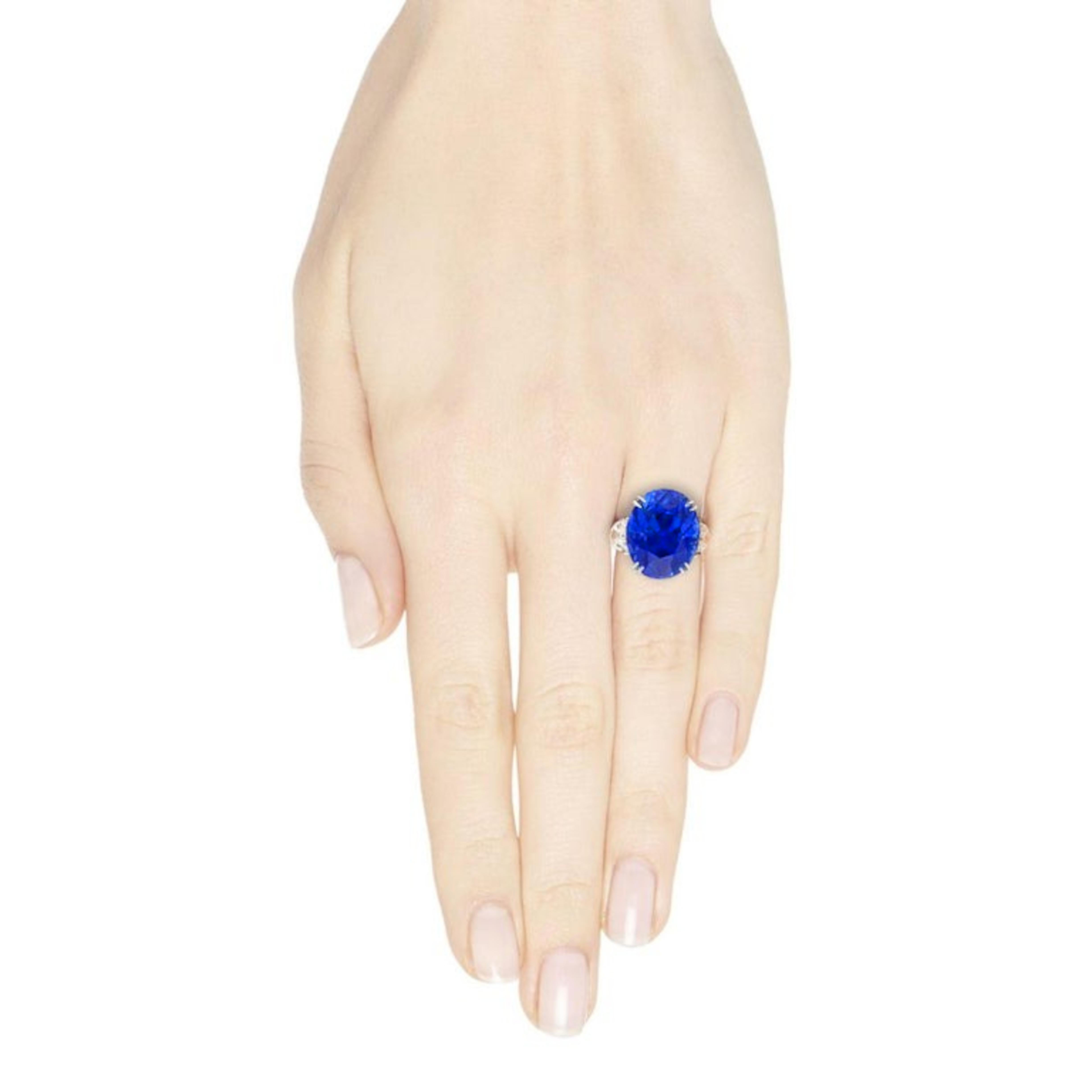 Oval Cut C. Dunaigre 4.55  Carat VIVID Blue Unheated Diamond Engagement Ring For Sale