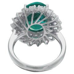 C. Dunaigre 4.96 Carat Colombian Emerald and Diamond Cluster Ring