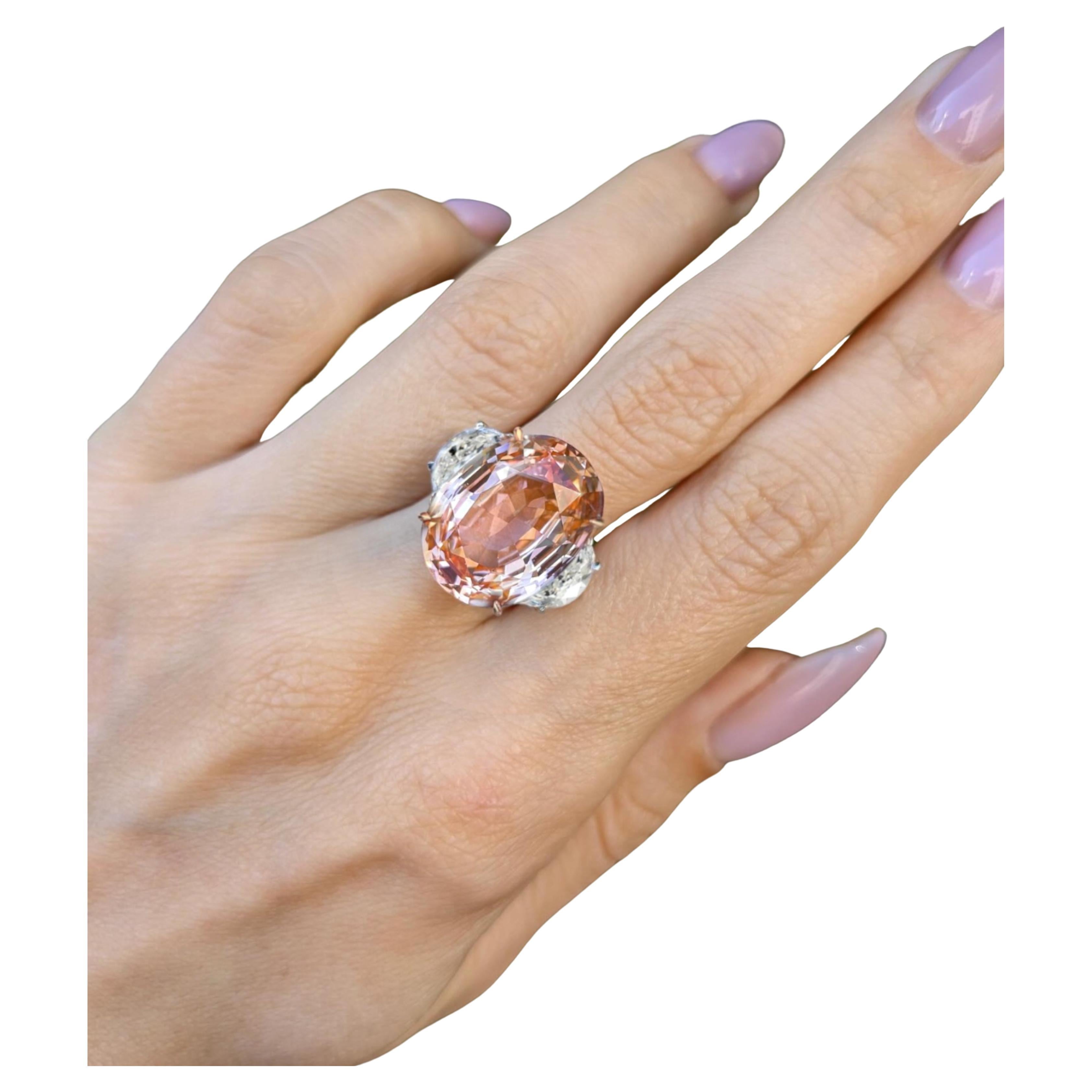 Oval Cut C. Dunaigre 8.08 Carat Padparadscha Diamond Ring