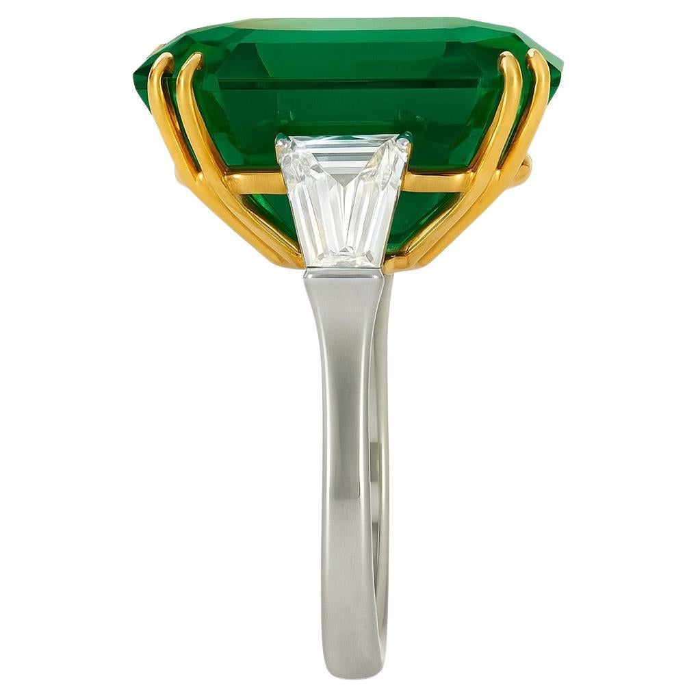 C. Dunaigre Certified 11.17 Carat Vivid Green Colombian Emerald & Diamond Ring – Minor Oil – 18K Yellow Gold & Platinum

Presenting an extraordinary jewel that represents the pinnacle of rarity and refinement: an 11.00 carat vivid green Colombian
