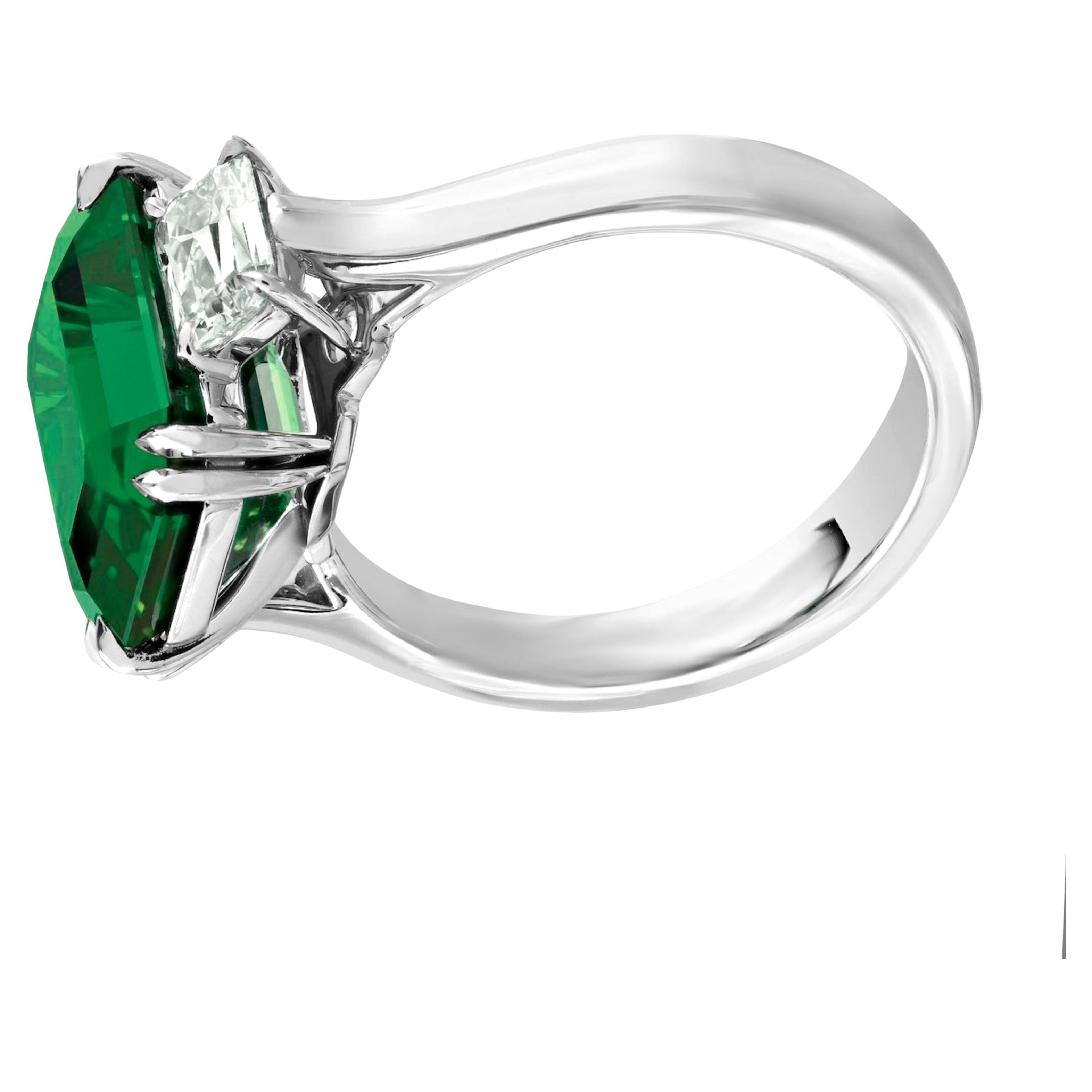 C. Dunaigre-Certified 7 Carat Vivid Green Emerald Ring in Platinum with Trapezoid Diamonds

This exceptional 7.00 carat natural emerald is certified by C. Dunaigre and showcases a vivid green hue with insignificant oil, placing it among the most