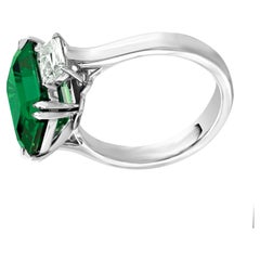 C. Dunaigre-Certified 7 Carat Vivid Green Emerald Ring