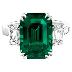 C. Dunaigre-Certified 7 Carat Vivid Green Emerald Ring