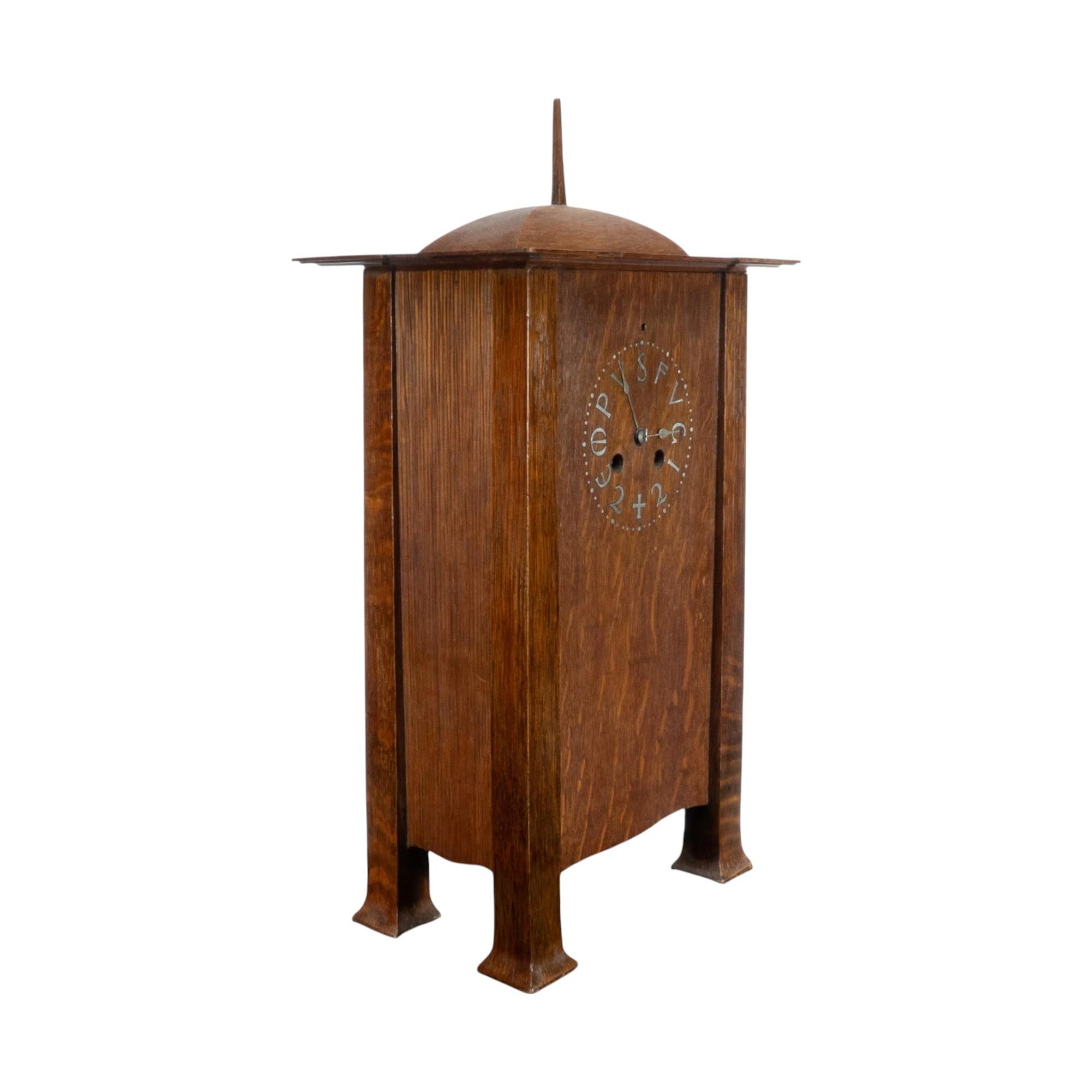 British C. F. A. Voysey (1857–1941). A rare Arts and Crafts oak mantel clock For Sale