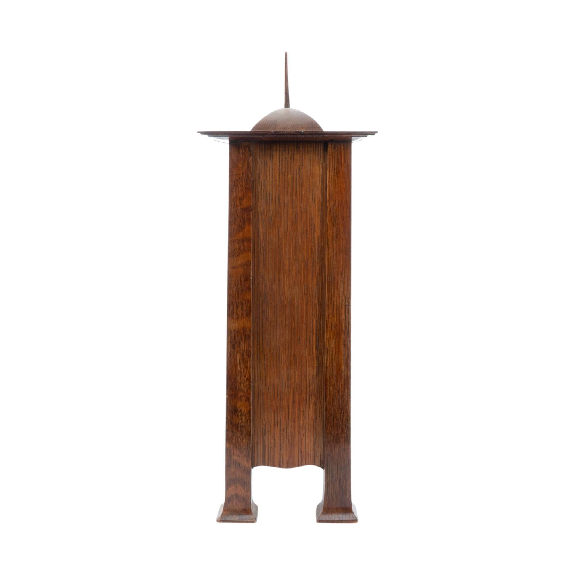 Hand-Crafted C. F. A. Voysey (1857–1941). A rare Arts and Crafts oak mantel clock For Sale