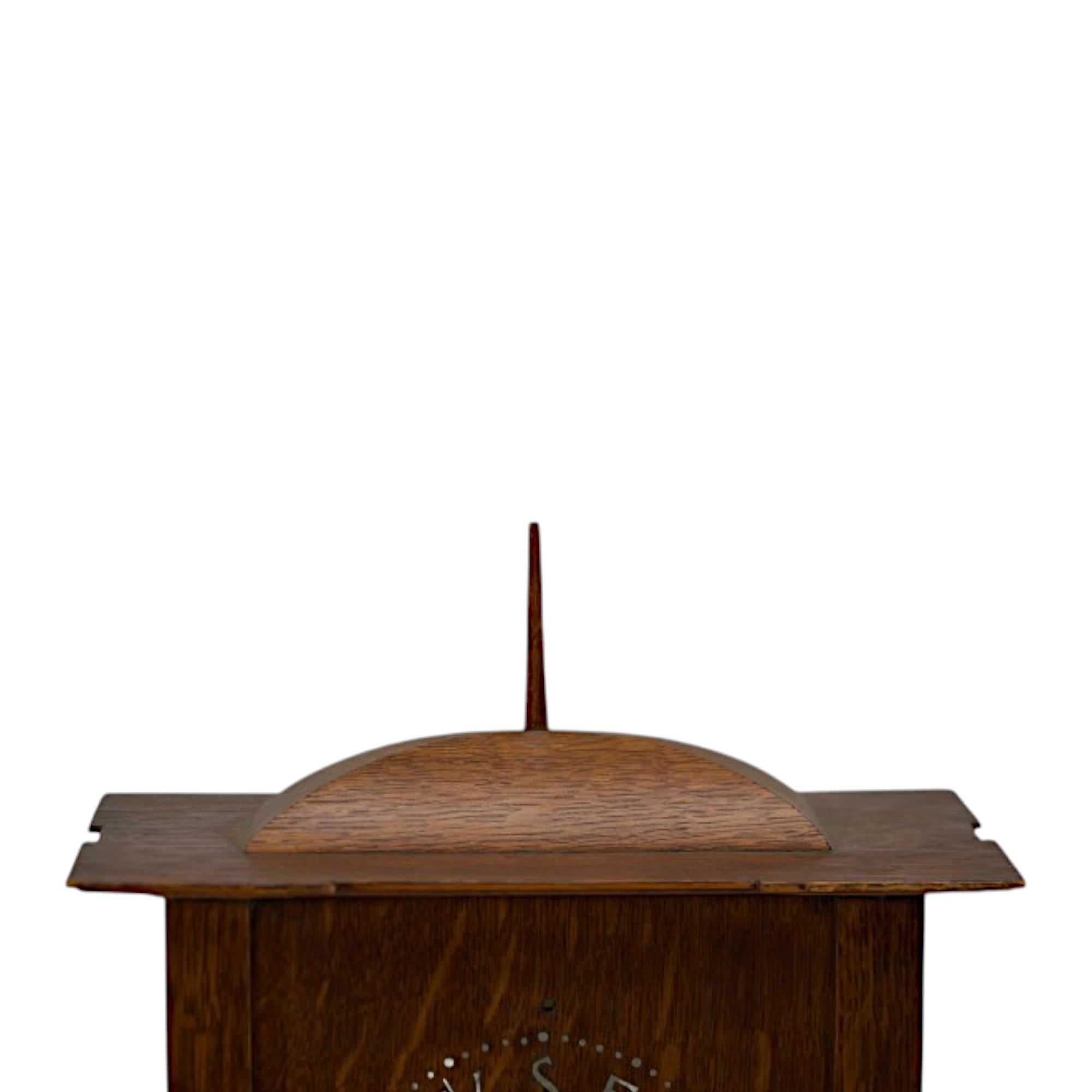 19th Century C. F. A. Voysey (1857–1941). A rare Arts and Crafts oak mantel clock For Sale