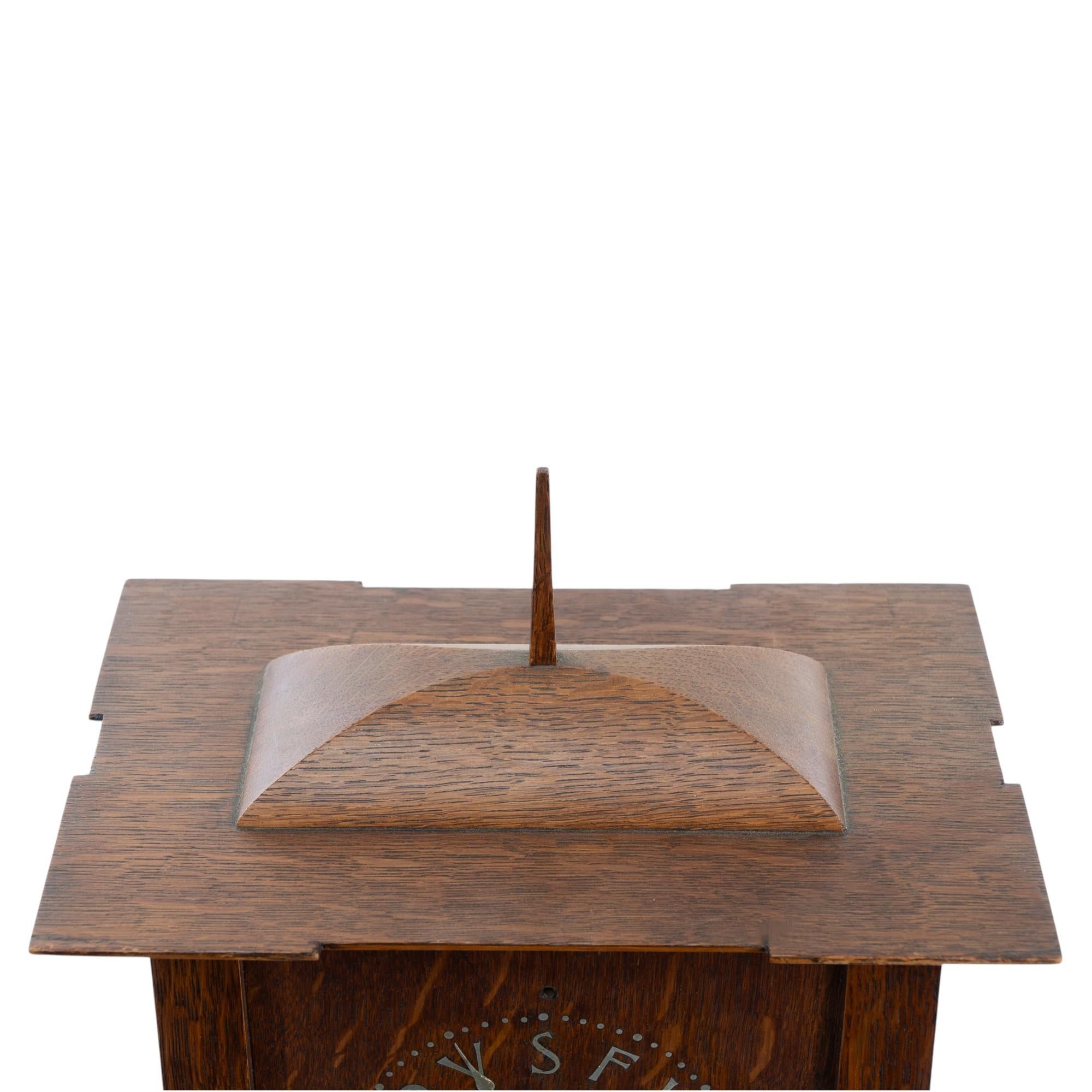 Oak C. F. A. Voysey (1857–1941). A rare Arts and Crafts oak mantel clock For Sale