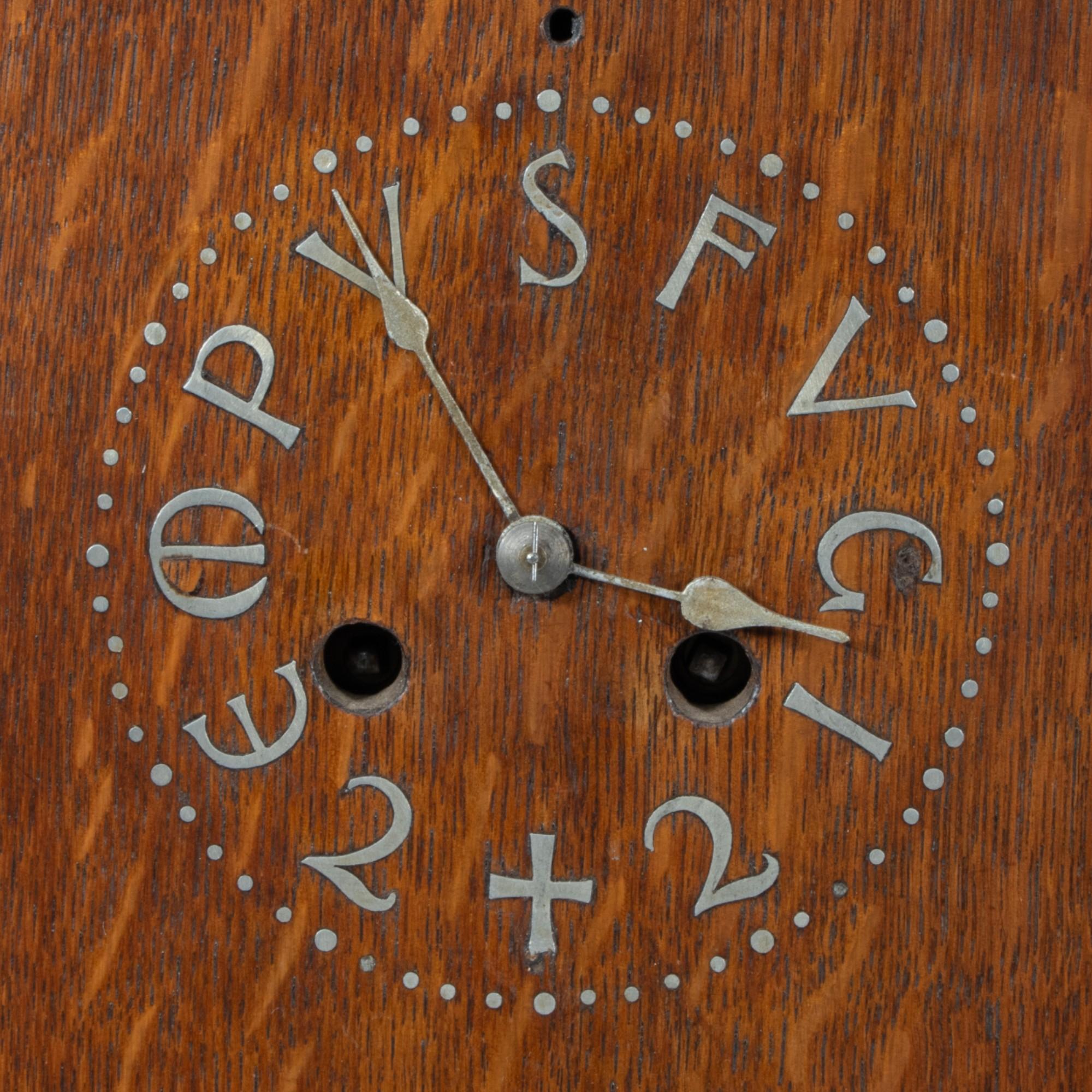 C. F. A. Voysey (1857–1941). A rare Arts and Crafts oak mantel clock For Sale 1
