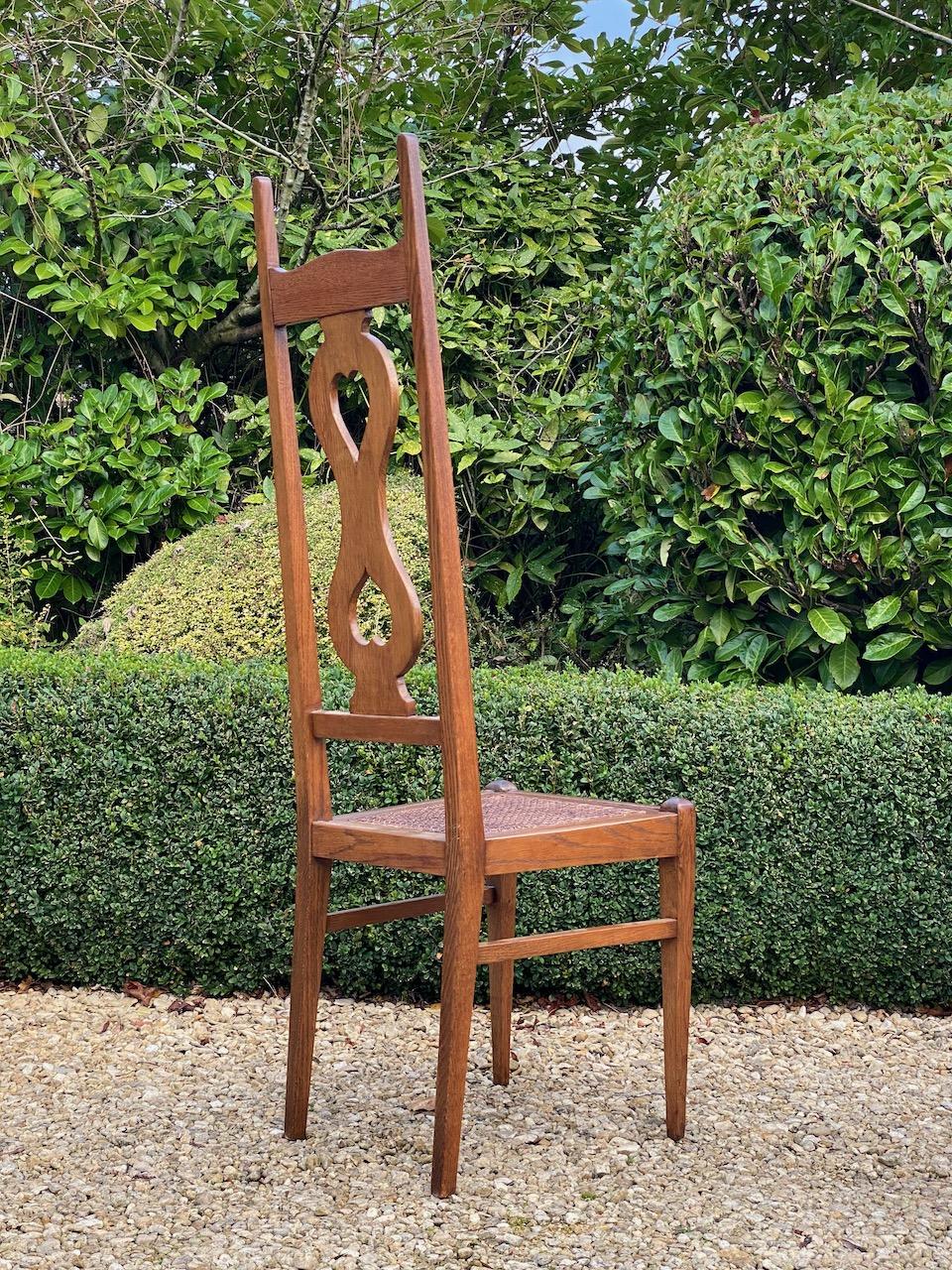 Arts and Crafts C F A Voysey Arts & Crafts Oak Dining Chairs Set of Eight by Liberty & Co, 1930