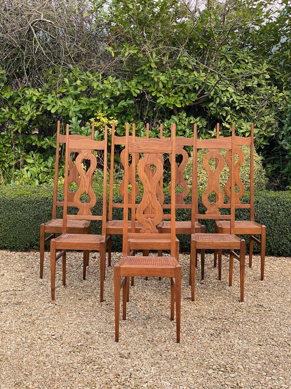 C F A Voysey Arts & Crafts Oak Dining Chairs Set of Eight by Liberty & Co, 1930 In Good Condition In Longdon, Tewkesbury