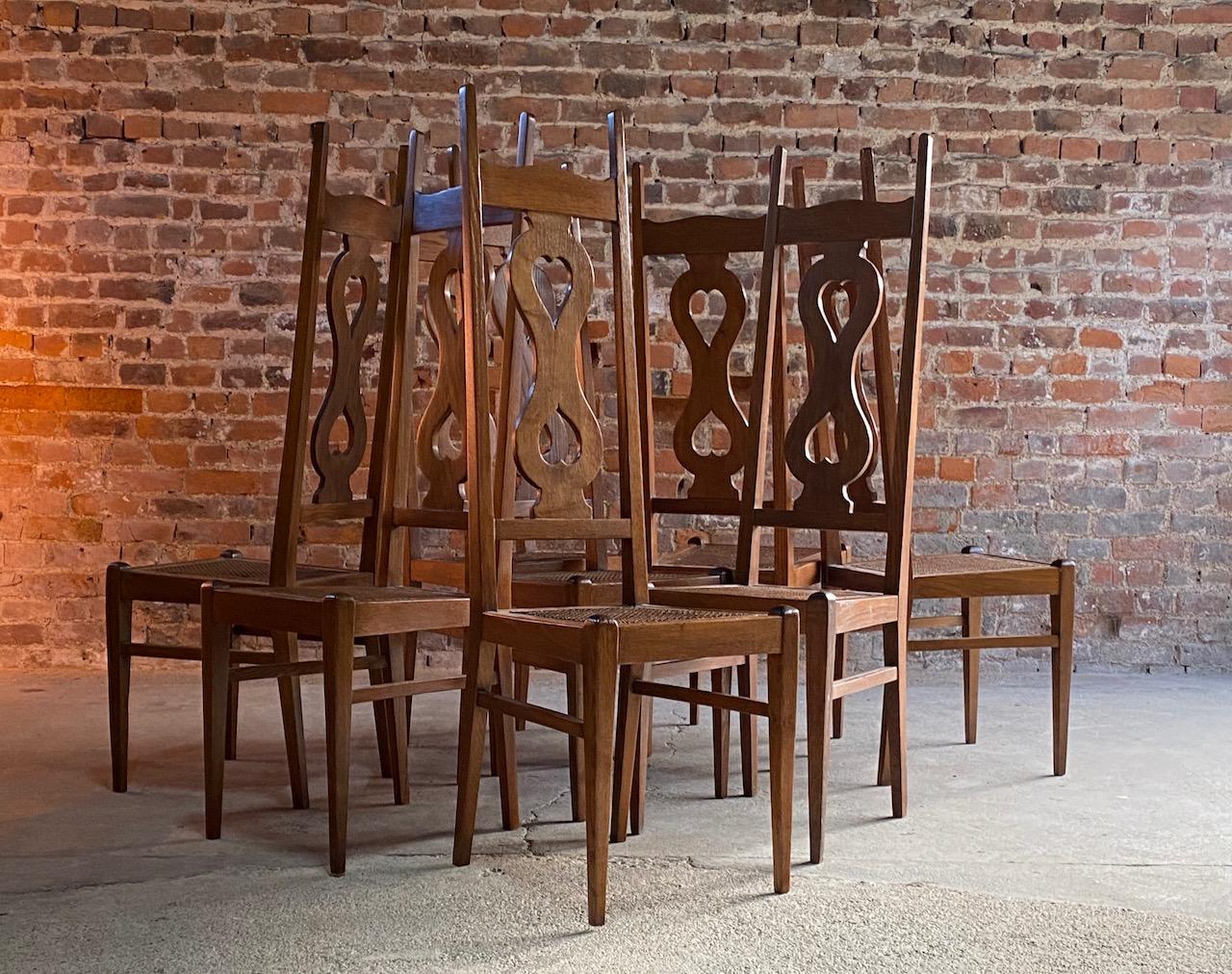 20th Century C F A Voysey Arts & Crafts Oak Dining Chairs Set of Eight by Liberty & Co, 1930