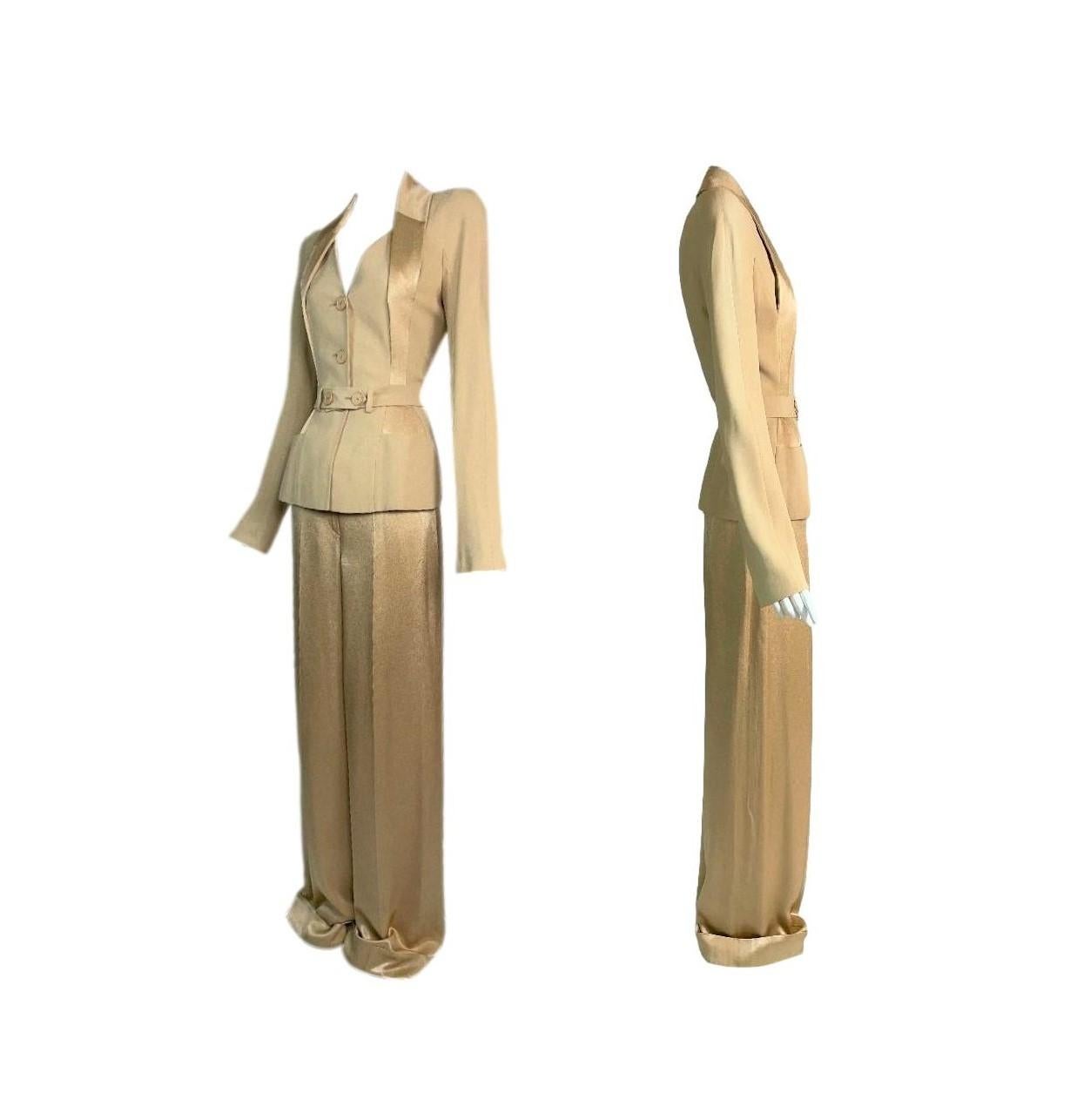 **THANK YOU FOR SHOPPING WITH MES DEUX FILLES**

DESIGNER: Circa F/W 2008 Christian Dior Haute Couture- inner fabric/year labels are not present so we are estimating the year based on the style. 
CONDITION: Good- down the right sleeve it is slightly