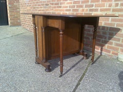 C Hindleys 134 Oxford St. London, a Quality Drop Leaf Victorian Oak Dining Table