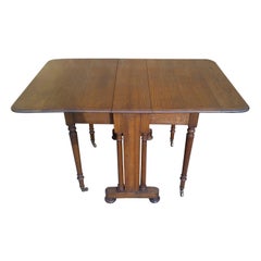 Antique C Hindleys 134 Oxford St. London, a Quality Drop Leaf Victorian Oak Dining Table