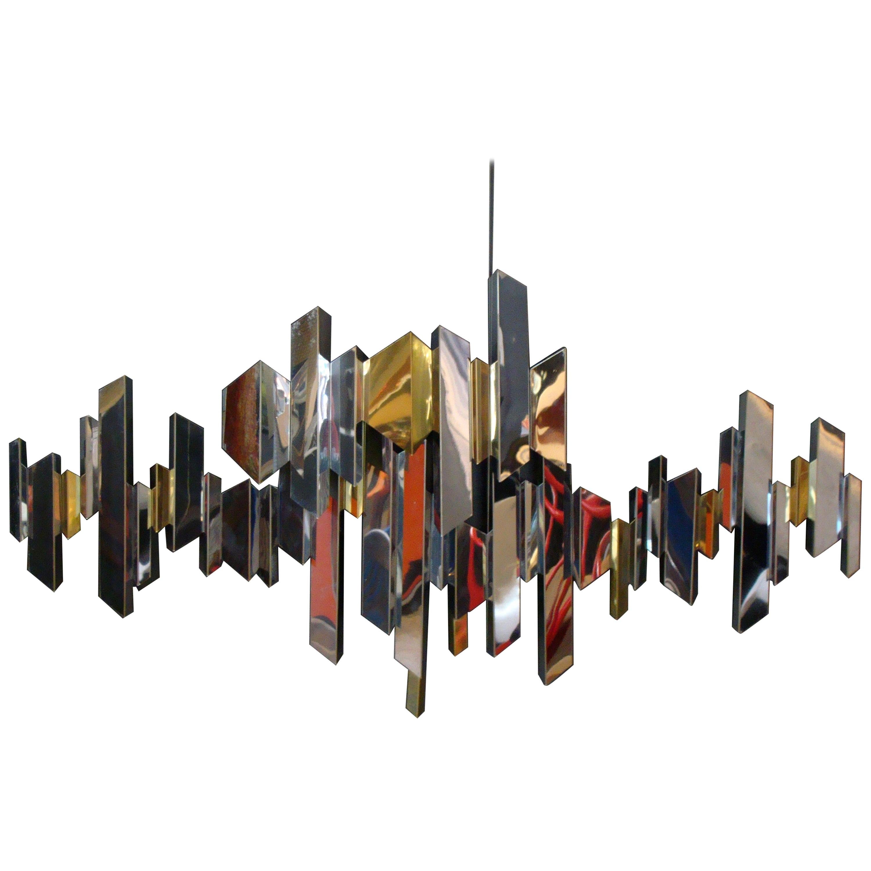 C. Jere "Cityscape" Wall Sculpture in Mirrored Stainless Steel, Chrome and Brass