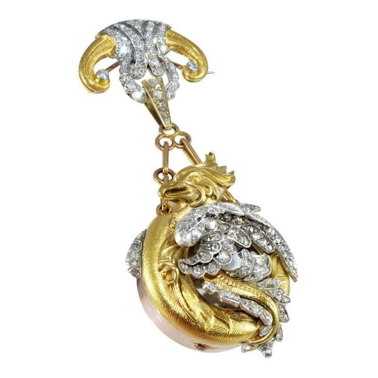 FACTORY / HOUSE: C. Marcks & Co.
STYLE / REFERENCE: Dragon / Griffin Pendant Watch 
METAL / MATERIAL: 18kt Yellow Gold
CIRCA / YEAR: 1900's
DIMENSIONS / SIZE: 80mm x 35mm
MOVEMENT / CALIBER: Manual Winding / 10 Jewels / High Grade Cylindrical