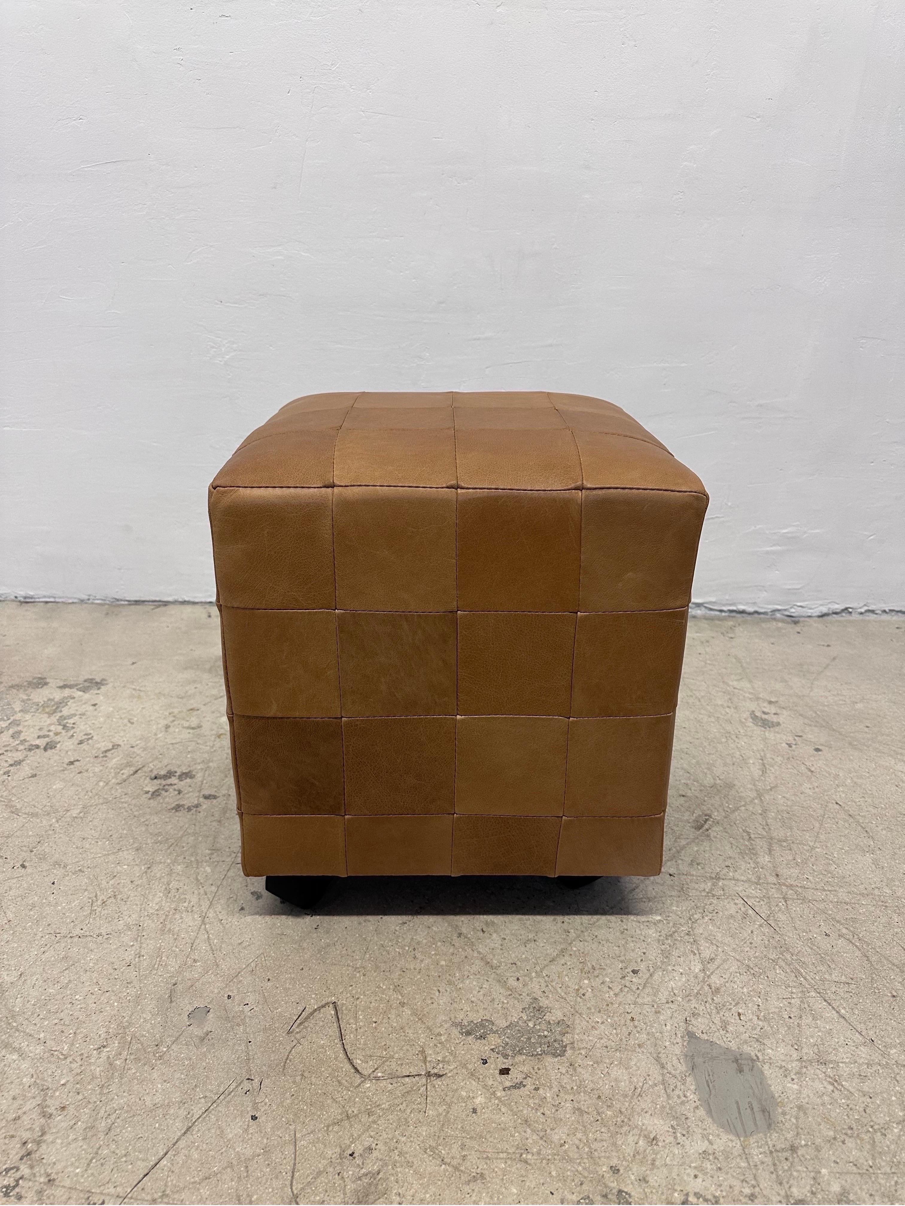Patchwork leather stool on casters by C Nissen’s Mobelfabrik.  The leather covered cushion sits on four casters, is lightweight and easy to move about.