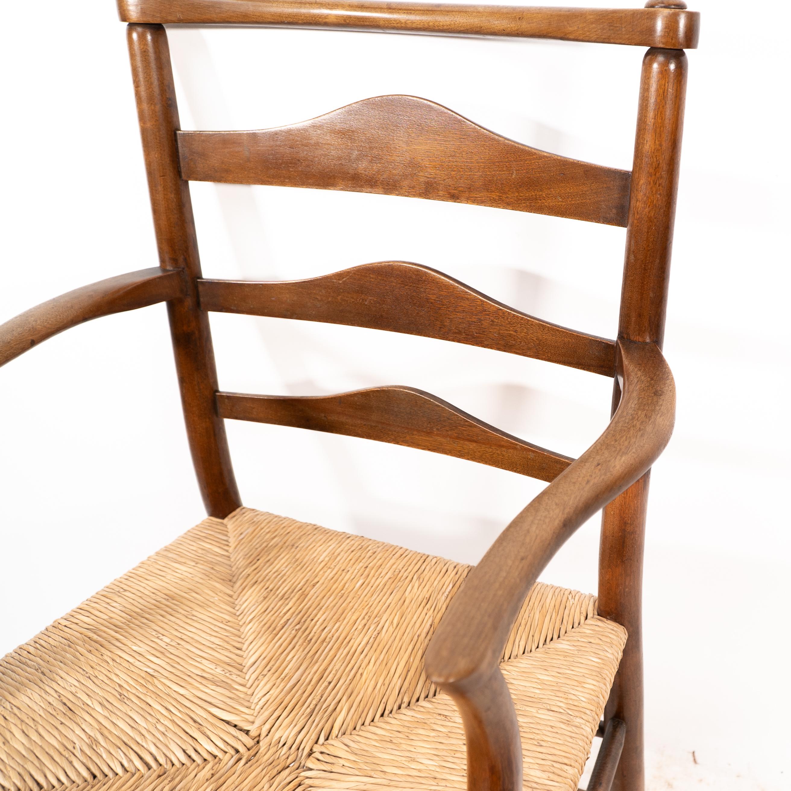 C R Ashbee. An Arts and Crafts rush seat ladder back armchair For Sale 5