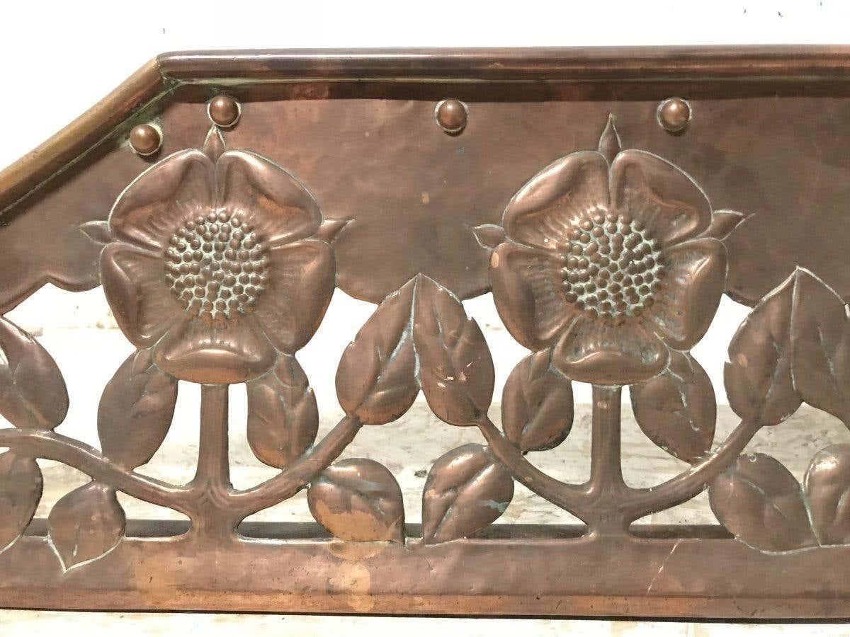 C R Ashbee, an Arts & Crafts Copper Fireplace Fender with Stylised Floral Design For Sale 1