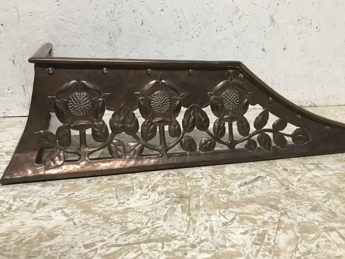 Hand-Crafted C R Ashbee, an Arts & Crafts Copper Fireplace Fender with Stylised Floral Design