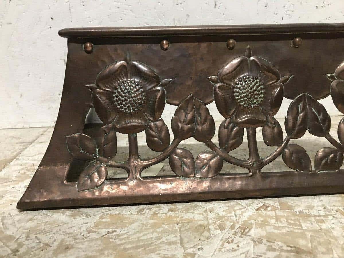 English C R Ashbee, an Arts & Crafts Copper Fireplace Fender with Stylised Floral Design For Sale