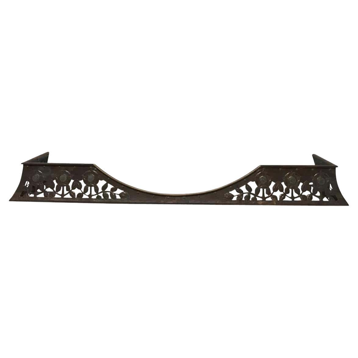 C R Ashbee, an Arts & Crafts Copper Fireplace Fender with Stylised Floral Design