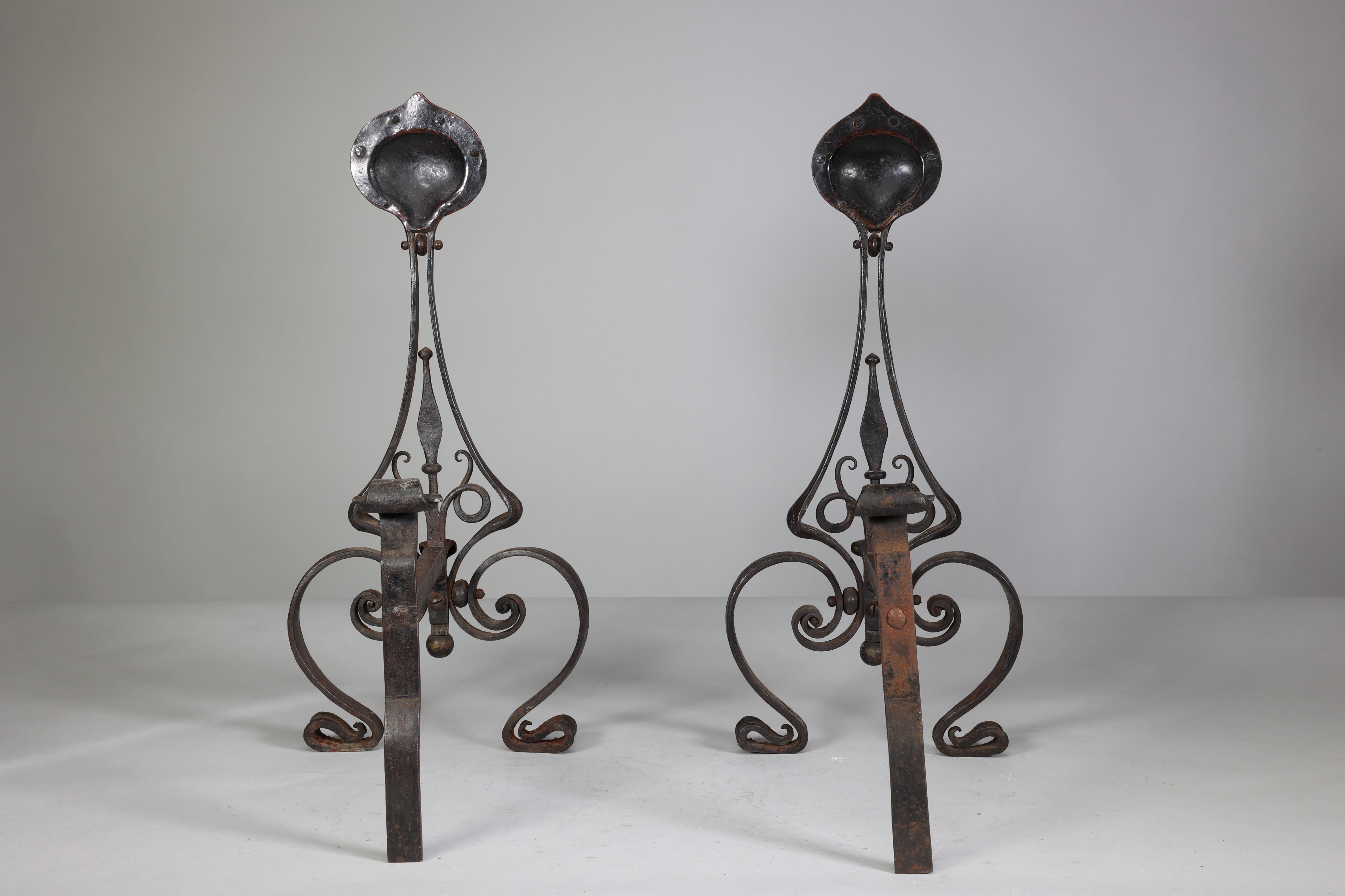 English C R Ashbee An early pair of Arts & Crafts hand wrought iron & copper fire dogs. For Sale