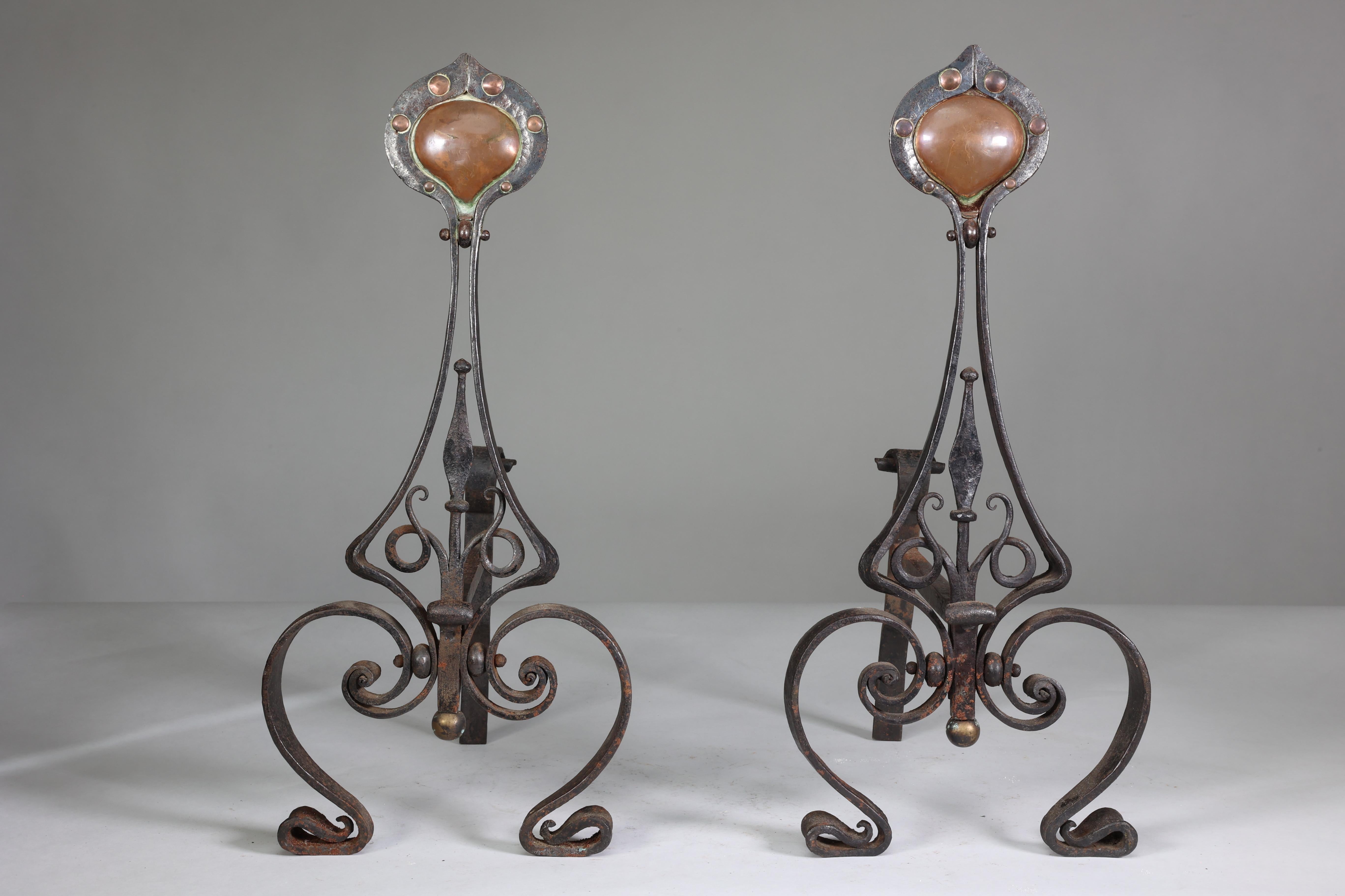 Arts and Crafts C R Ashbee An early pair of Arts & Crafts hand wrought iron & copper fire dogs. For Sale