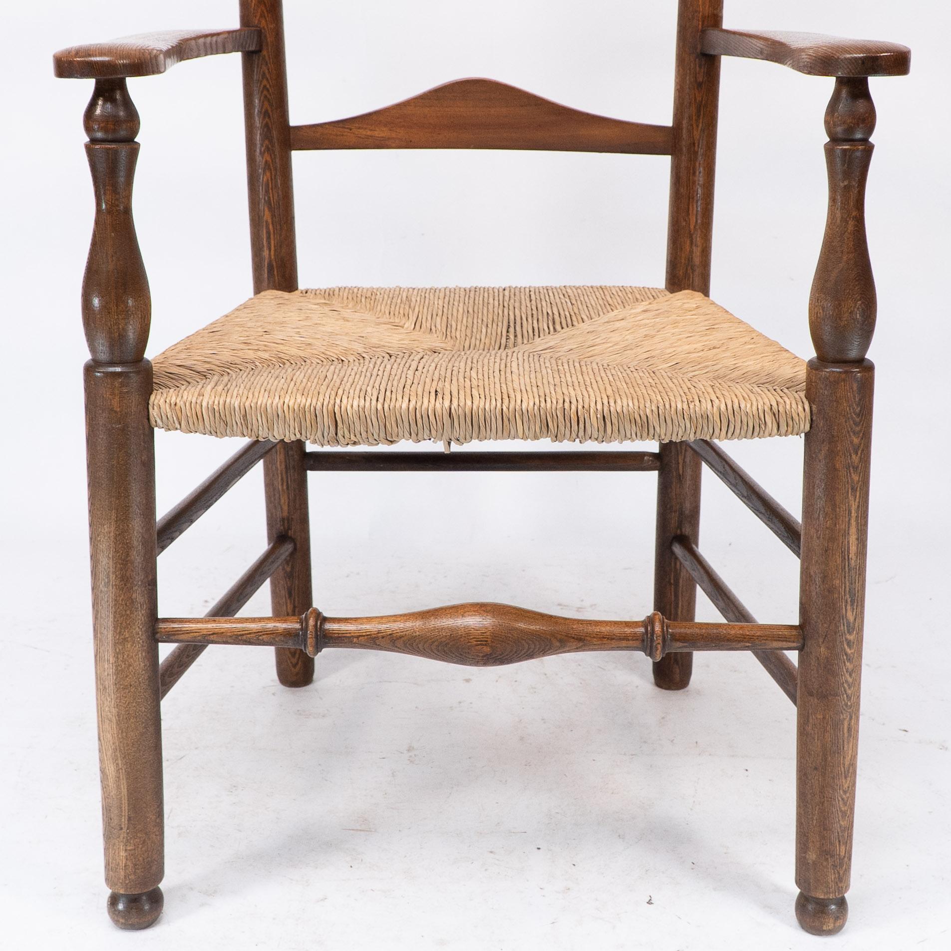 C. R. Ashbee attr. Un sillón Arts & Crafts con respaldo de escalera de roble y asiento reempotrado en venta 6