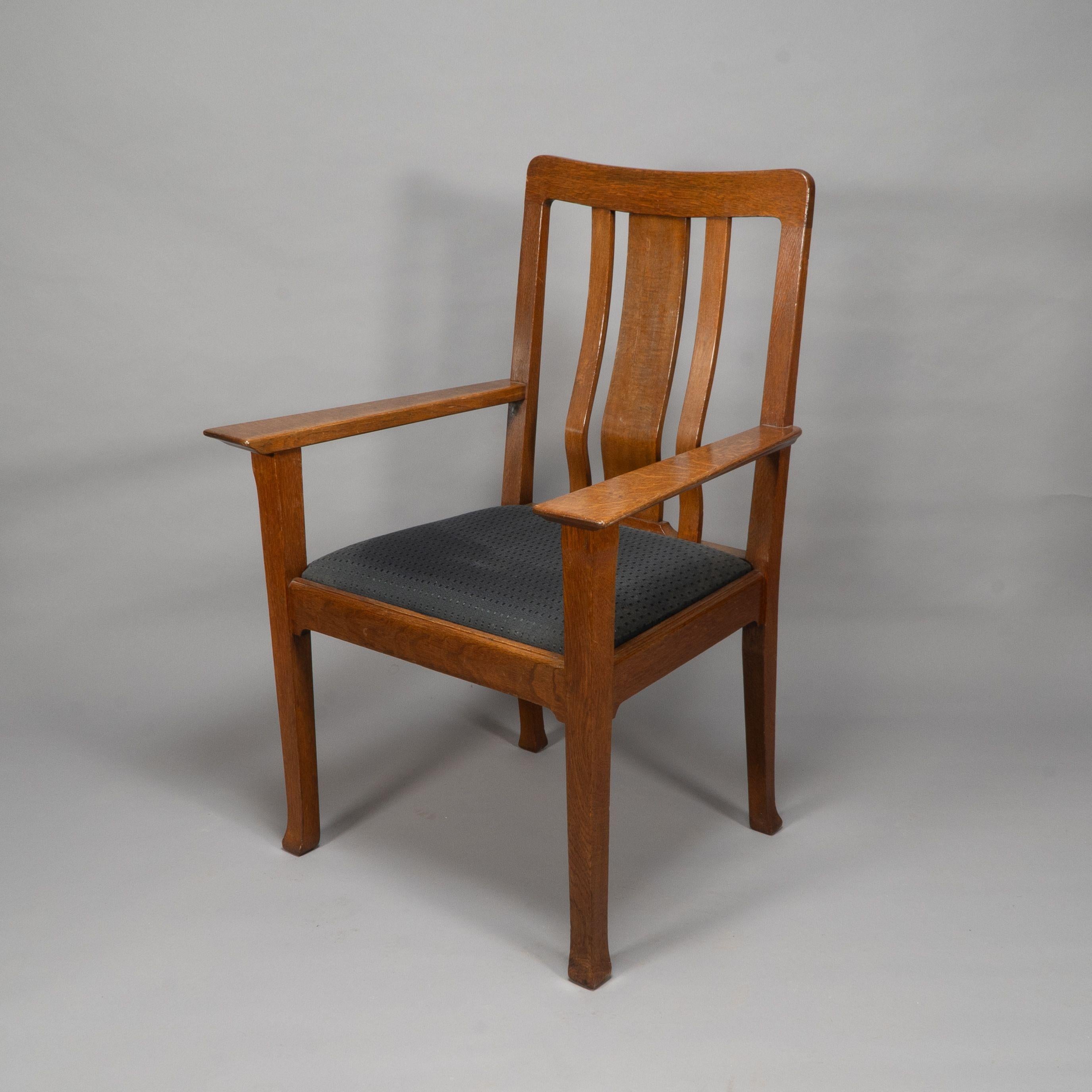 British C R Ashbee for The Guild of Handicraft. A rare Arts and Crafts oak armchair For Sale