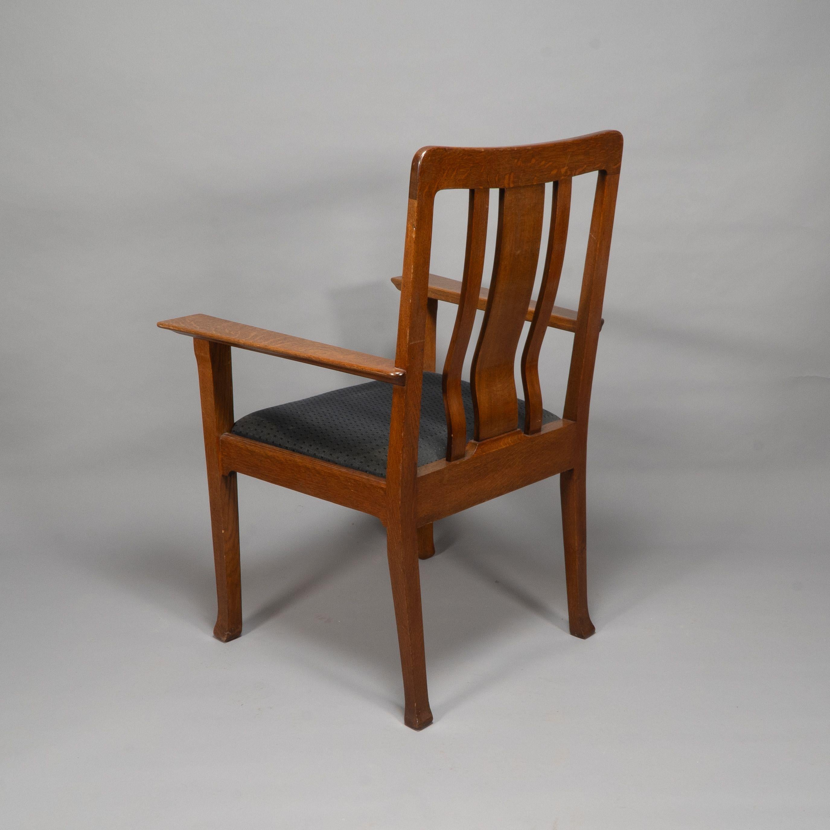 Early 20th Century C R Ashbee for The Guild of Handicraft. A rare Arts and Crafts oak armchair For Sale