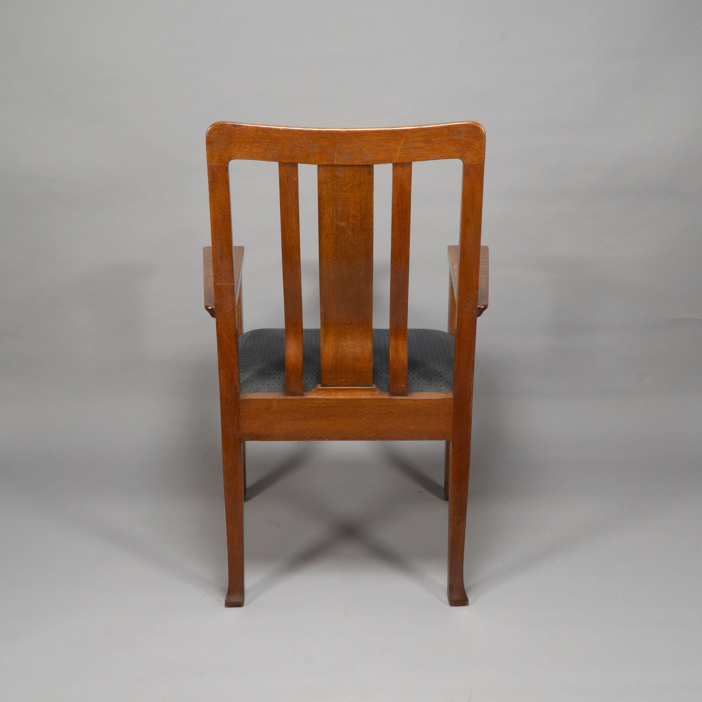 Oak C R Ashbee for The Guild of Handicraft. A rare Arts and Crafts oak armchair For Sale
