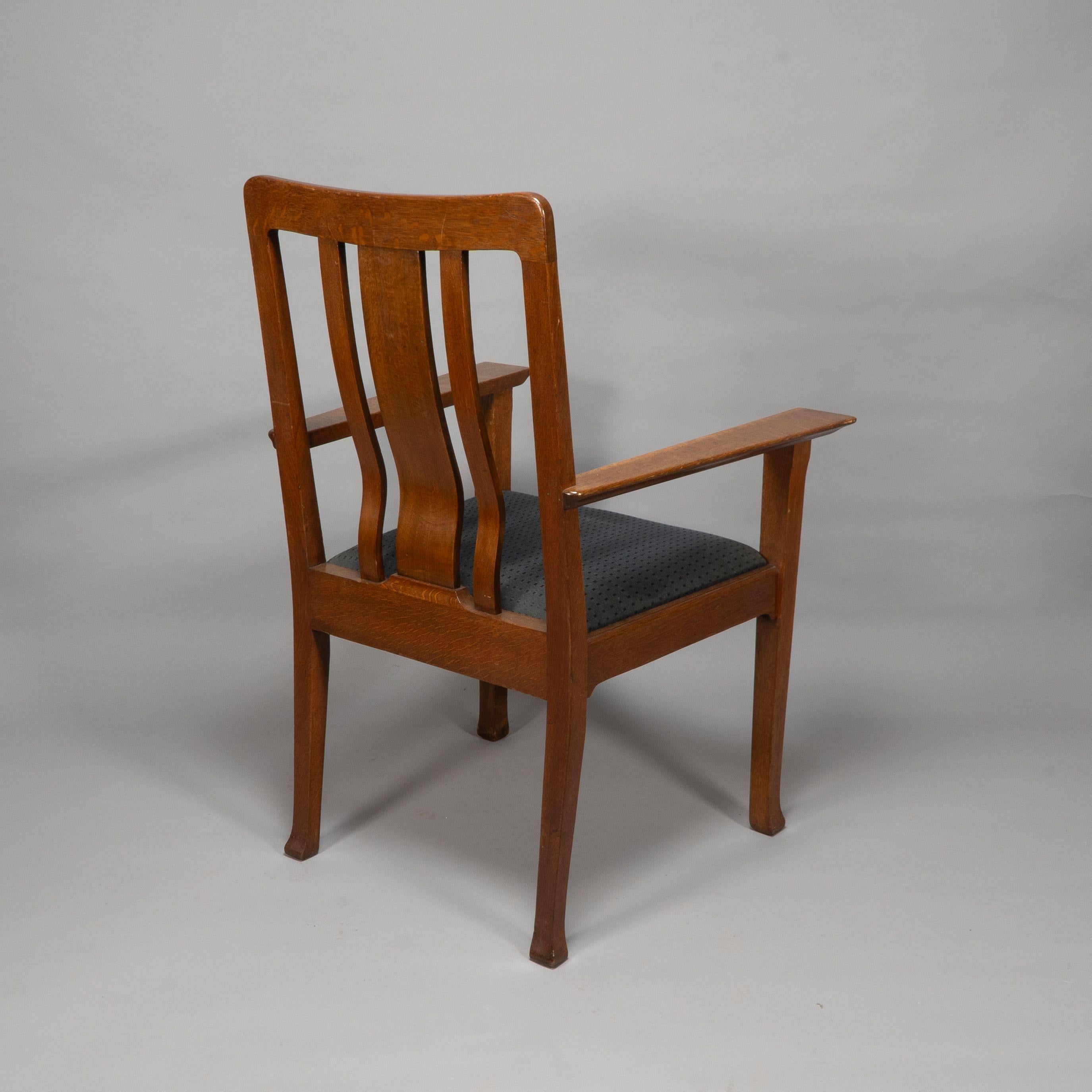 C R Ashbee for The Guild of Handicraft. A rare Arts and Crafts oak armchair For Sale 1