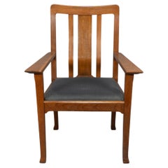 C.I.C. pour The Guild of Handicraft. Rare fauteuil en chêne de style Arts and Crafts