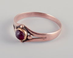 C. AT&T, Rønne, bague Art déco en or rouge 14 carats.