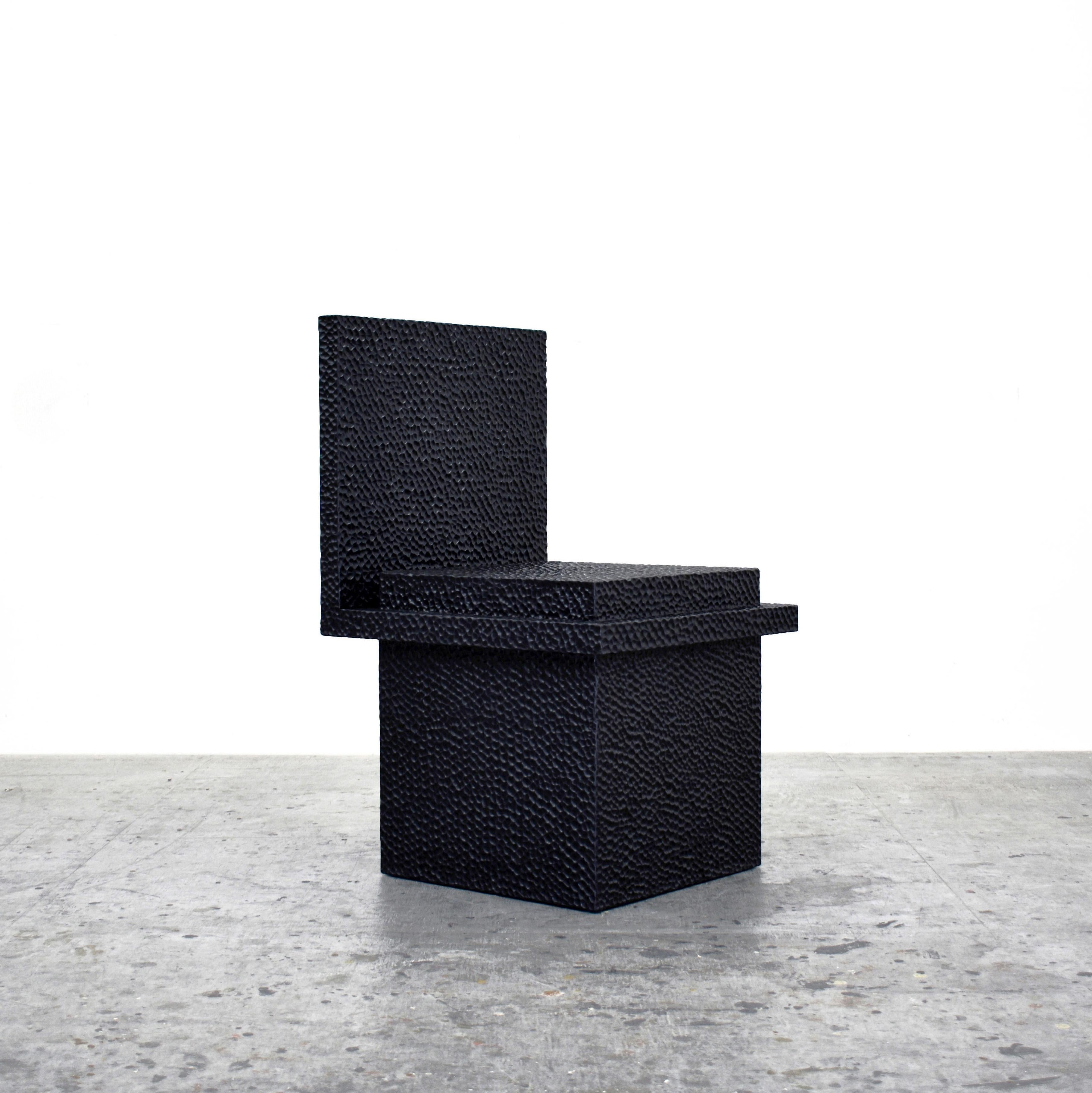 C1 chair by John Eric Byers.
Dimensions: 49.5 x 45.8 x 77.5 cm
Materials: Carved blackened maple

All works are individually handmade to order.

John Eric Byers creates geometrically inspired pieces that are minimal, emotional, and modernly