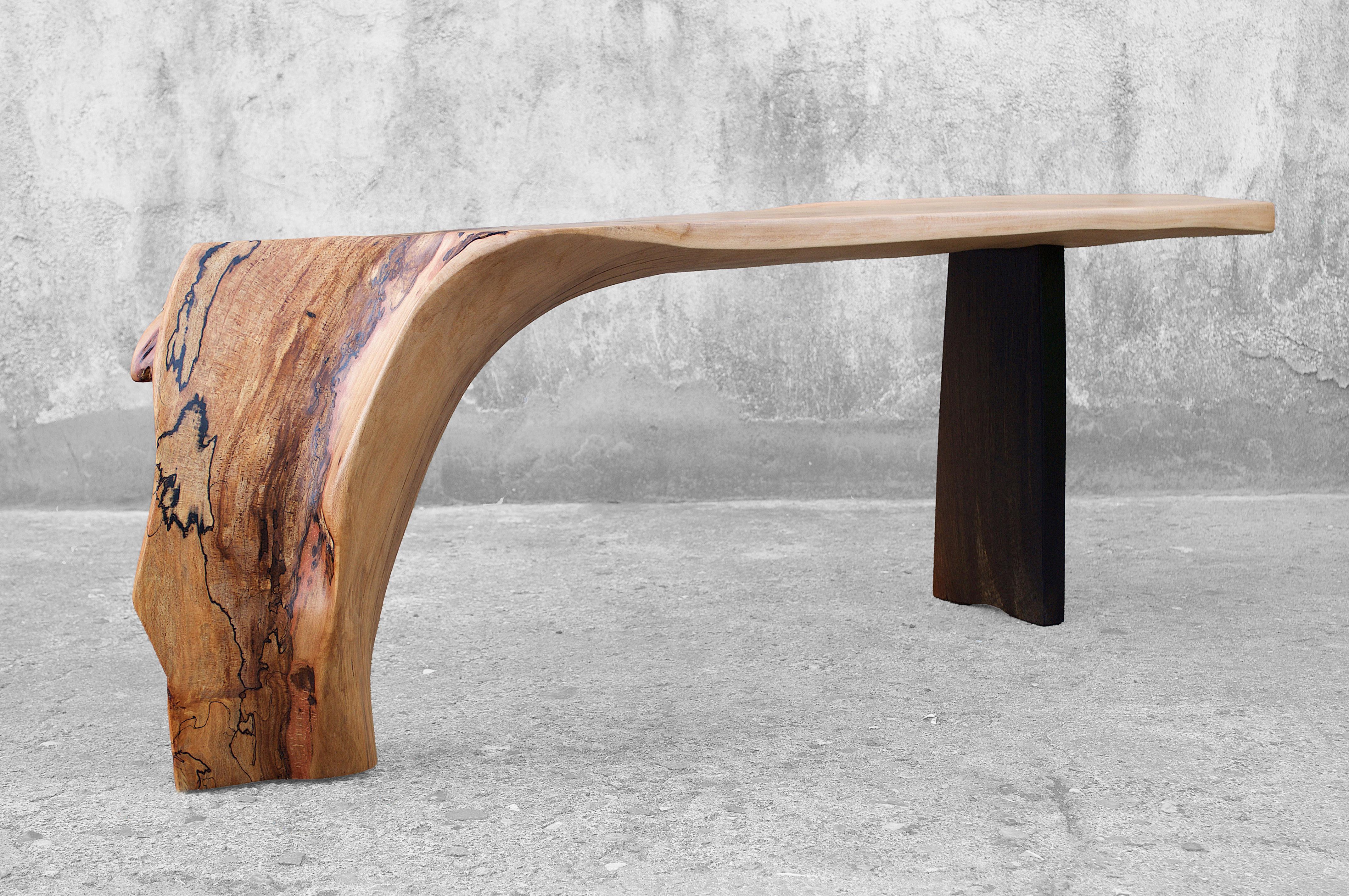 C1166 Console Table in Beech And Smoked Oak Wood by Jörg Pietschmann
Dimensions: D 40 x W 154 x H 51 cm.
Materials: Beech and smoked oak.

In Pietschmann’s sculptures, trees that for centuries were part of a landscape and founded in primordial